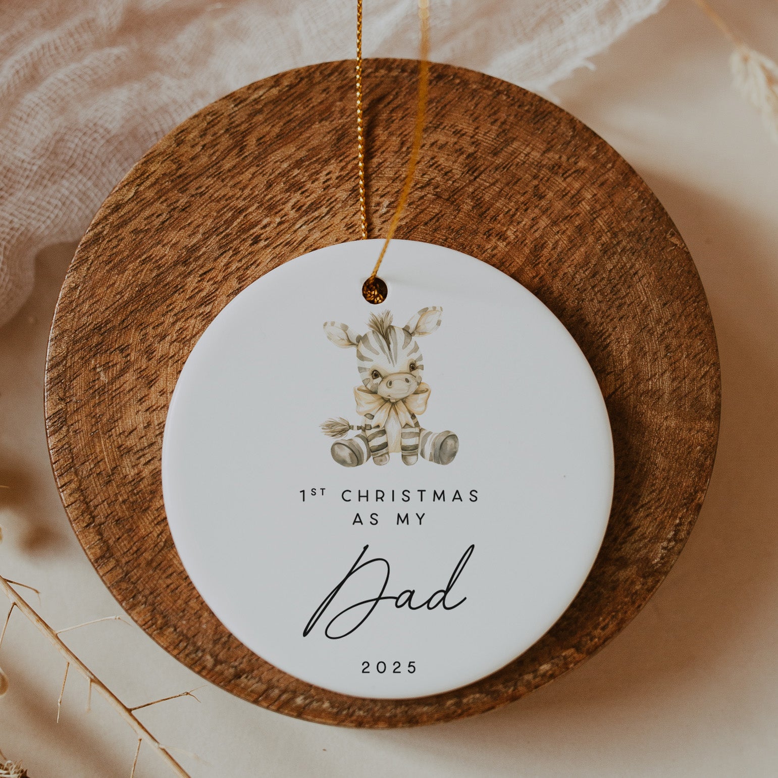Decorative ornament with '1st Christmas as my Dad 2025' text on a wooden base.