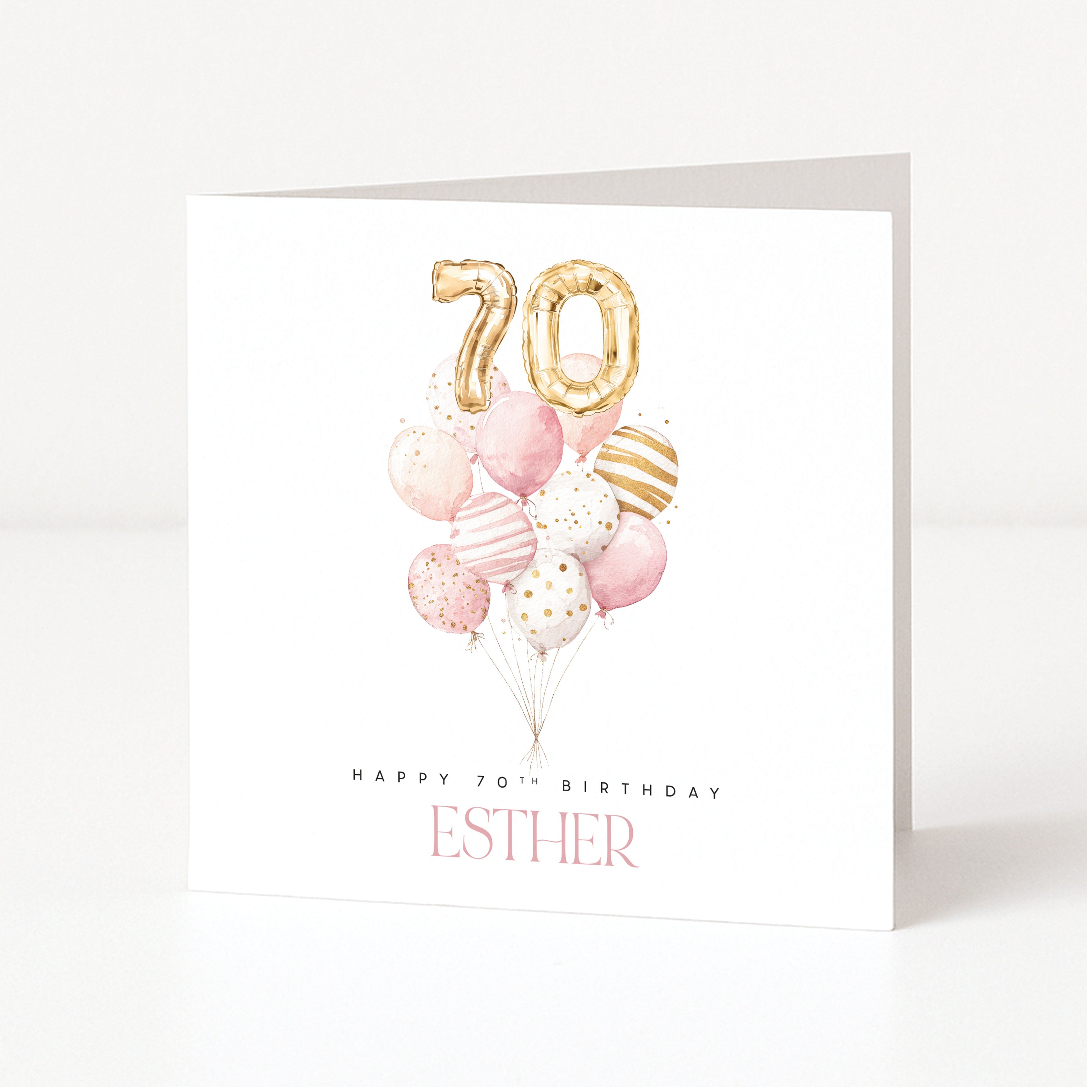 Personalised 70th birthday card for Esther with pink watercolour balloons and gold 70 number balloons.
