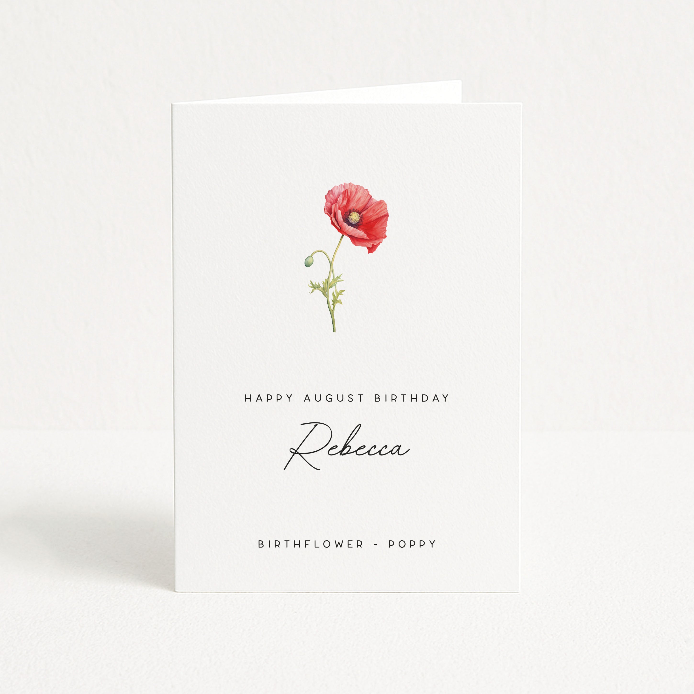 Greeting card with a red poppy illustration and text on a white background