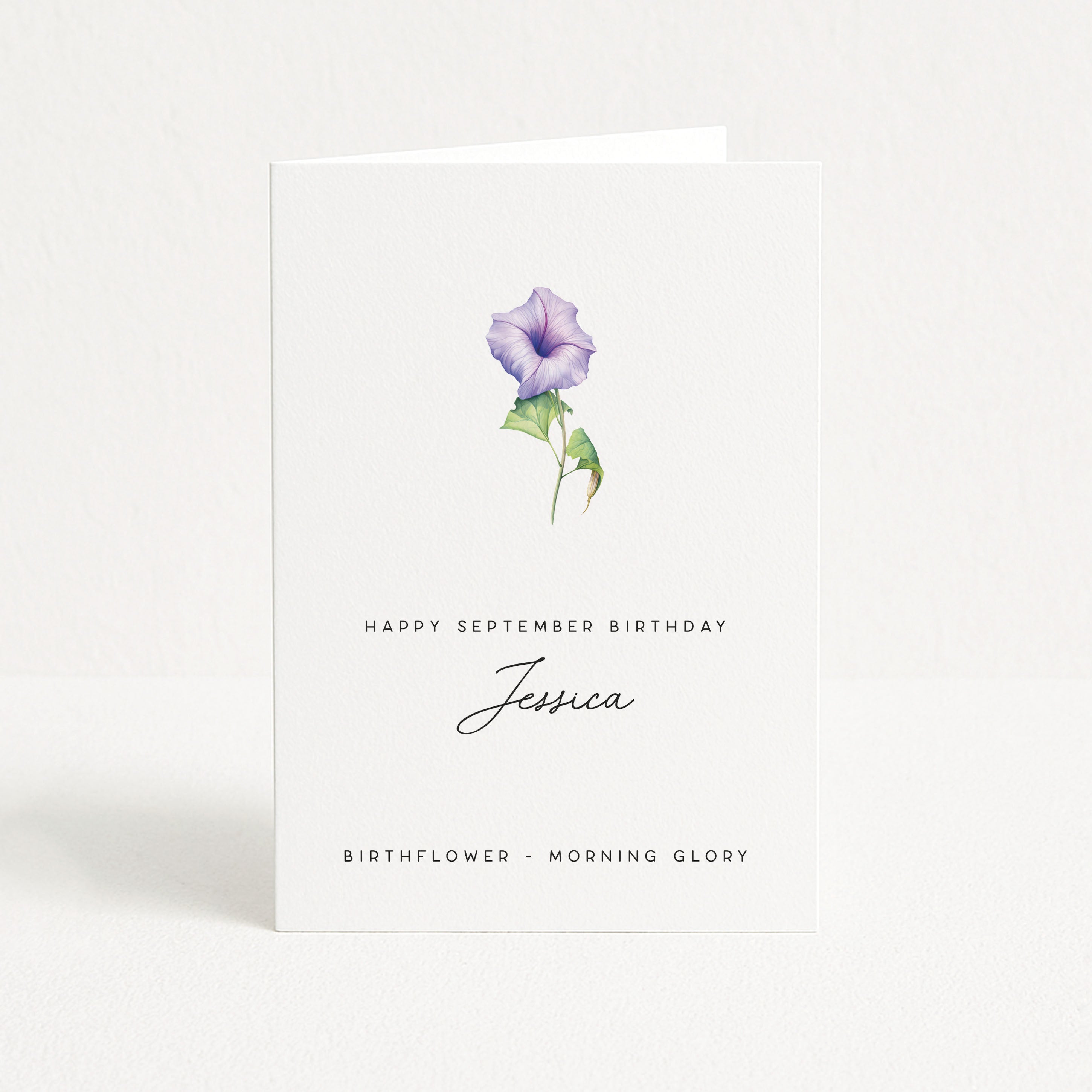 Greeting card with a purple flower illustration and text about Jessica's September birthday and birthflower.