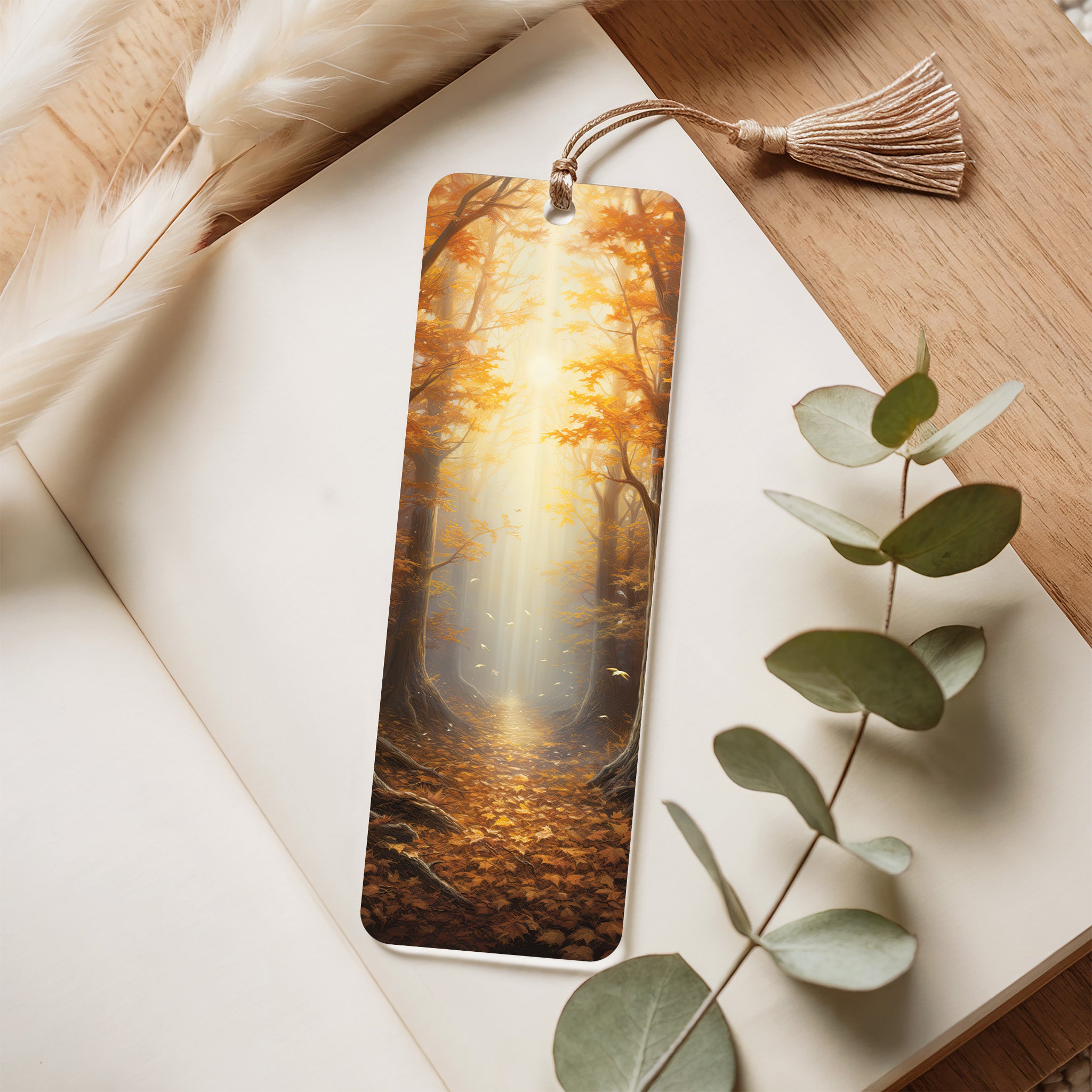 Bookmark with nature design on a wooden surface with eucalyptus leaves