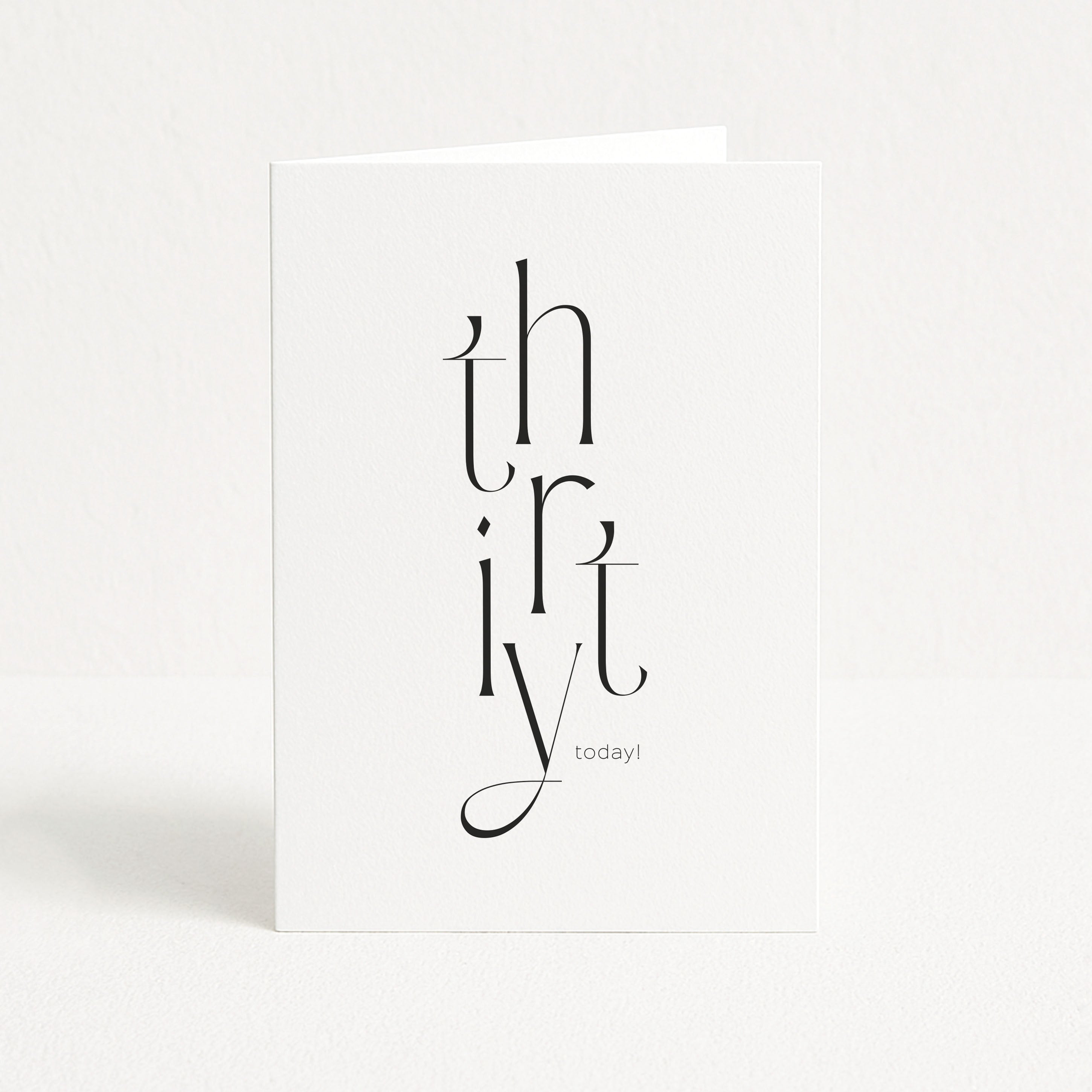White card with black text 'thirty today!' on a white background
