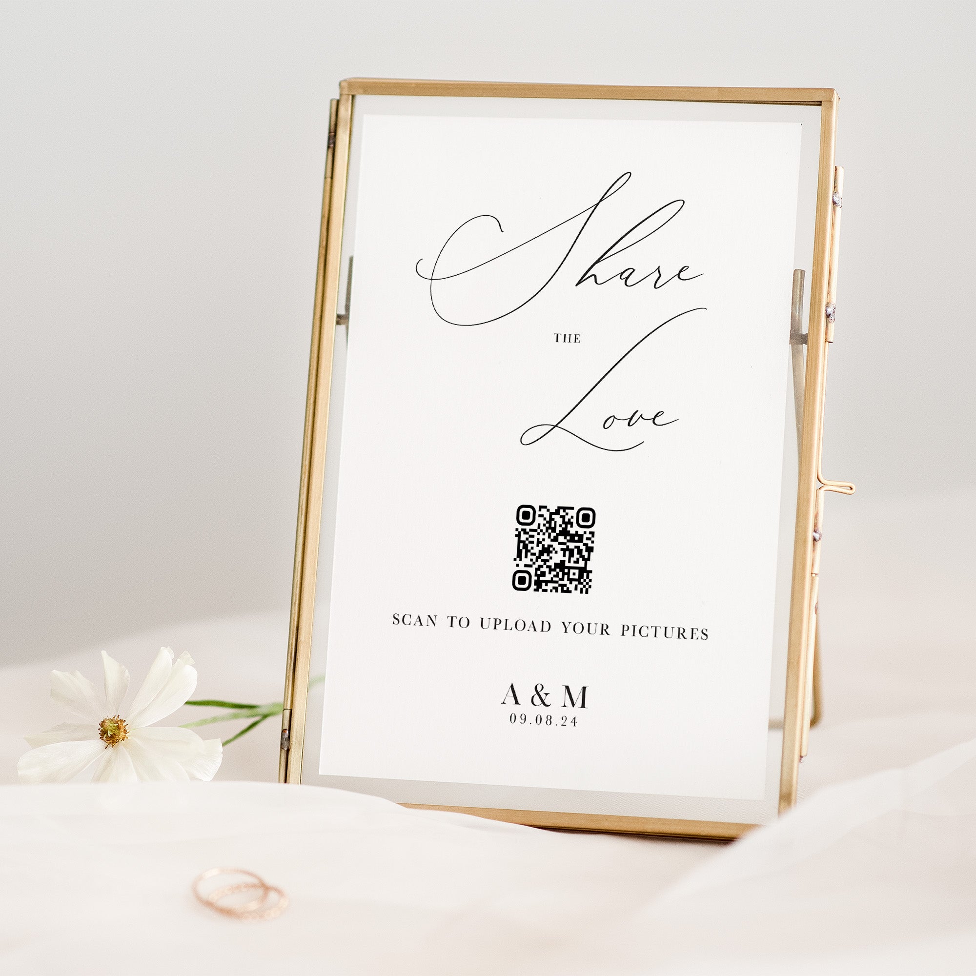 Framed print with 'Share the Love' text and QR code on a white background