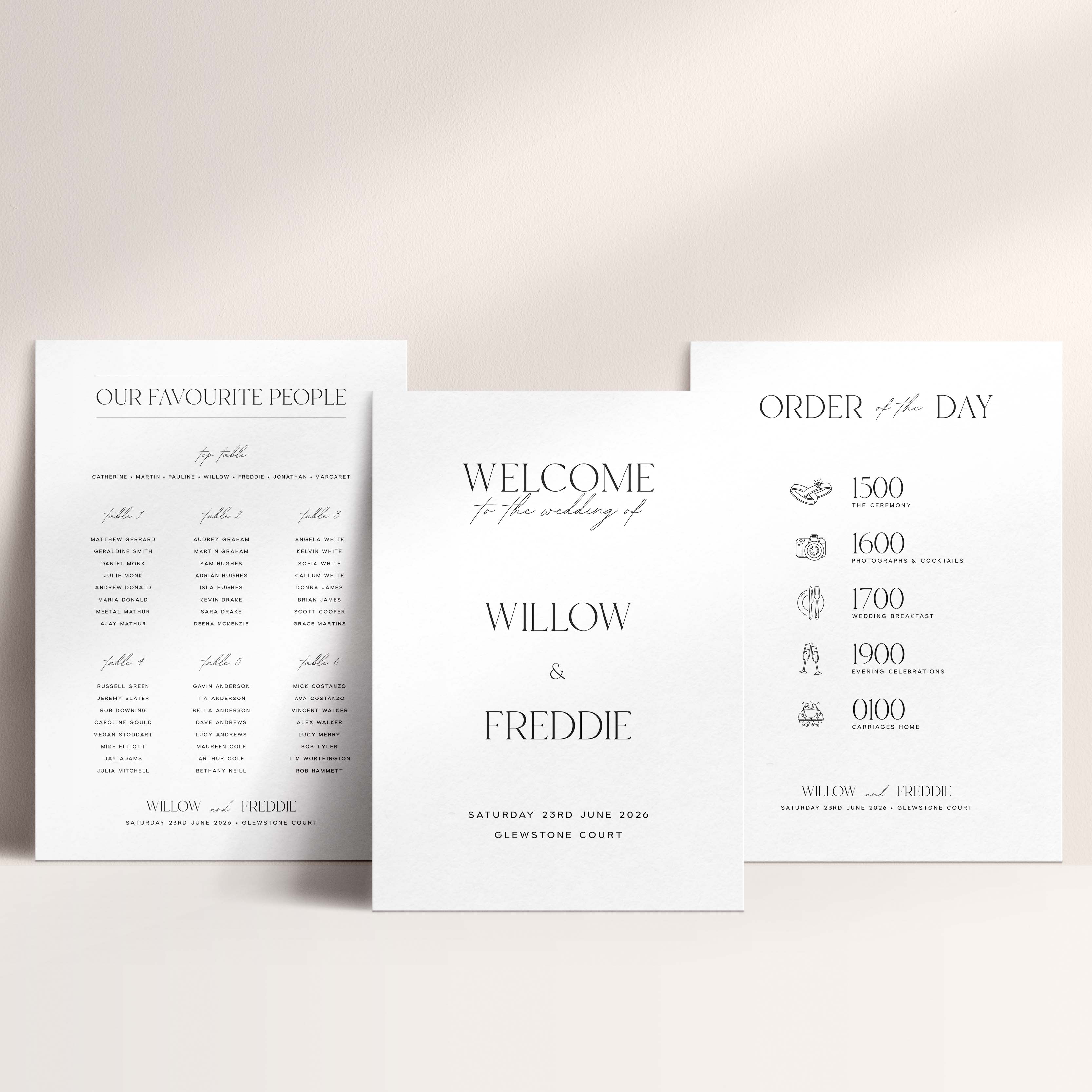 Three wedding signs on a light beige background