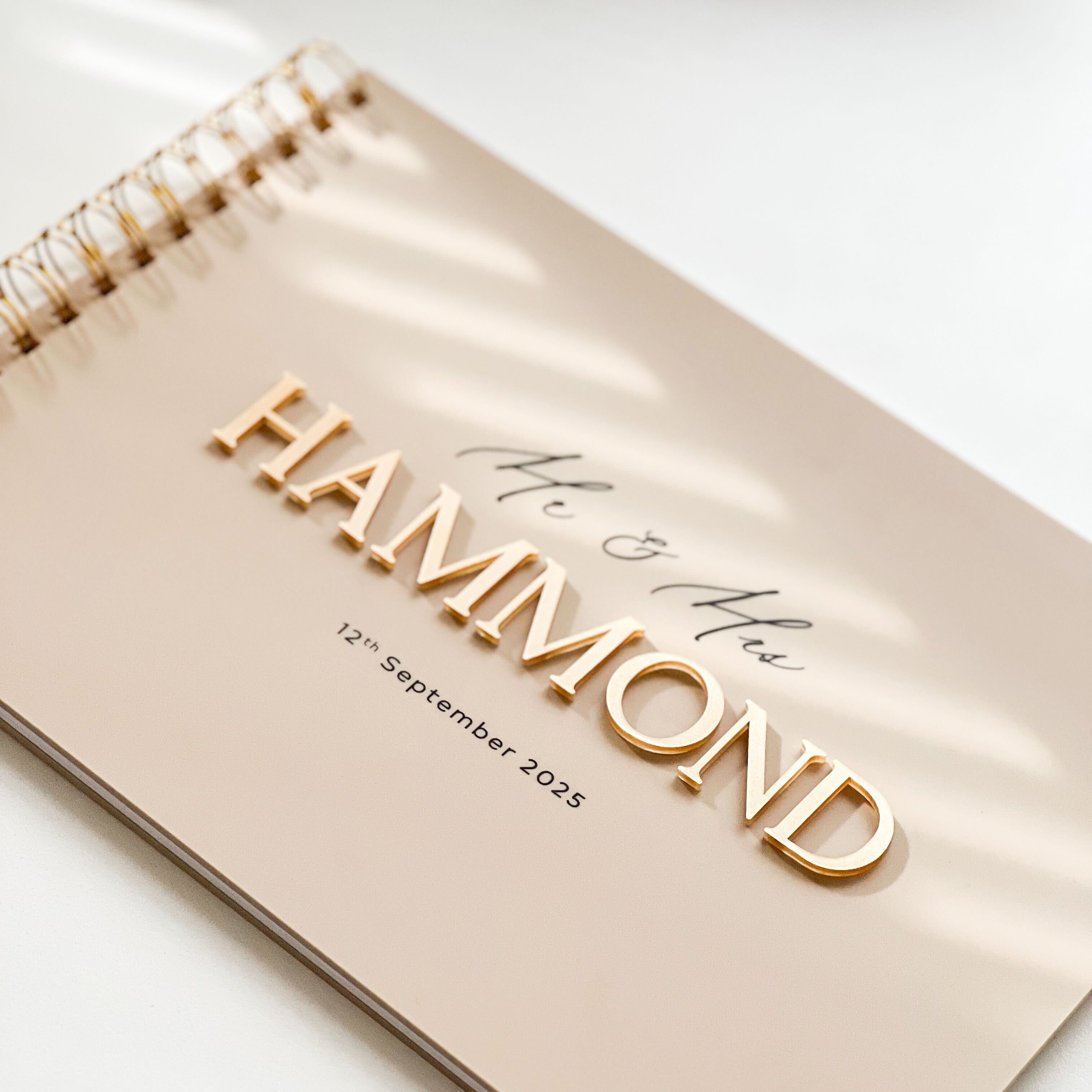 Beige Acrylic wedding guest book with caramel gold 3d lettering and UV printed black details