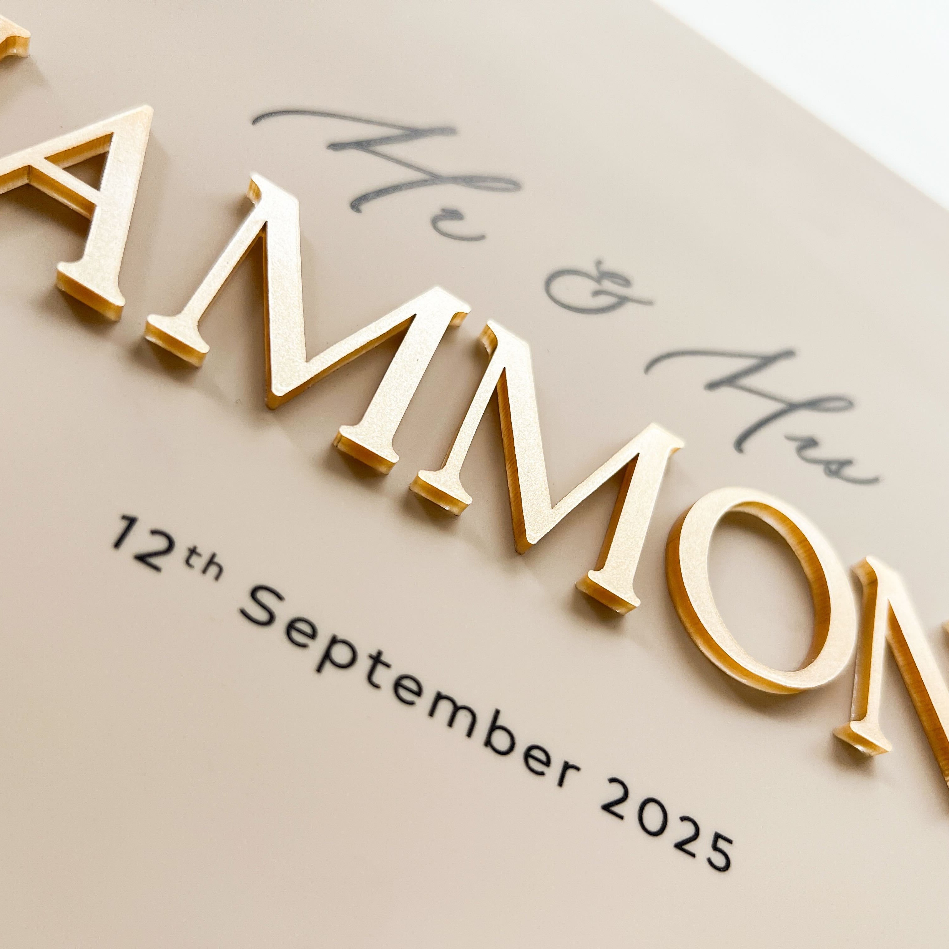 Beige Acrylic wedding guest book with caramel gold 3D lettering and UV printed black details