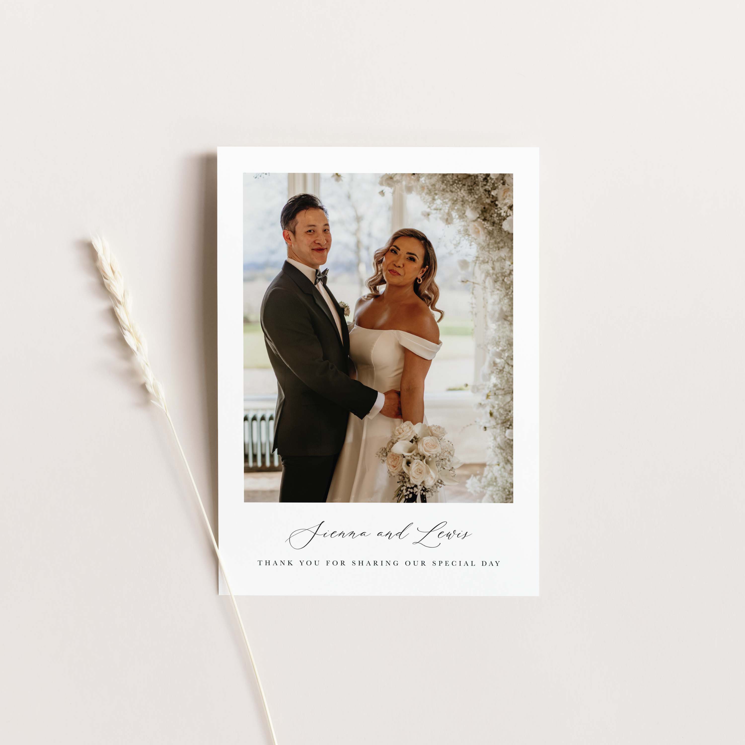 Wedding card with a couple's photo and 'Thank you for sharing our special day' text on a white background.