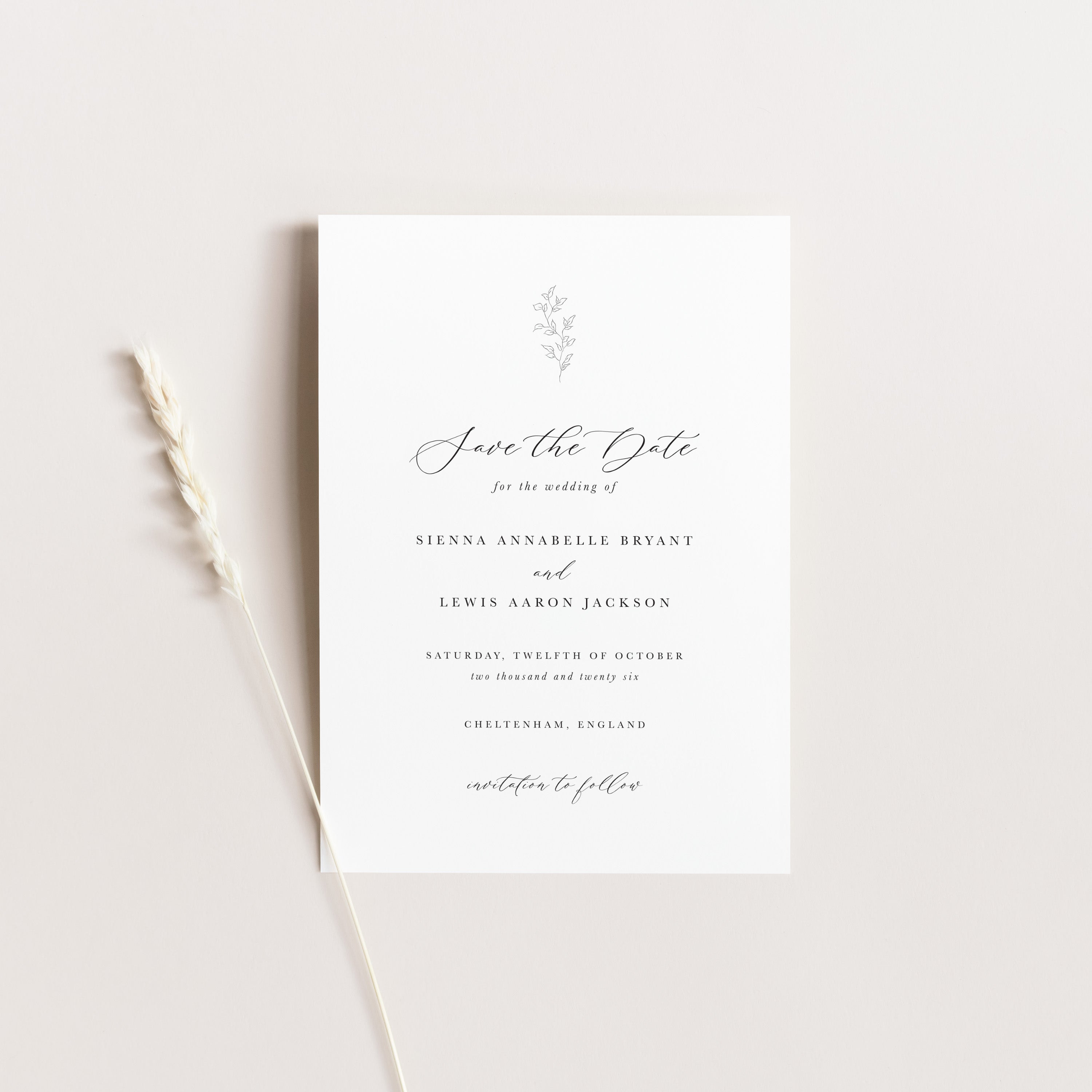 Elegant floral save the date card on a neutral background