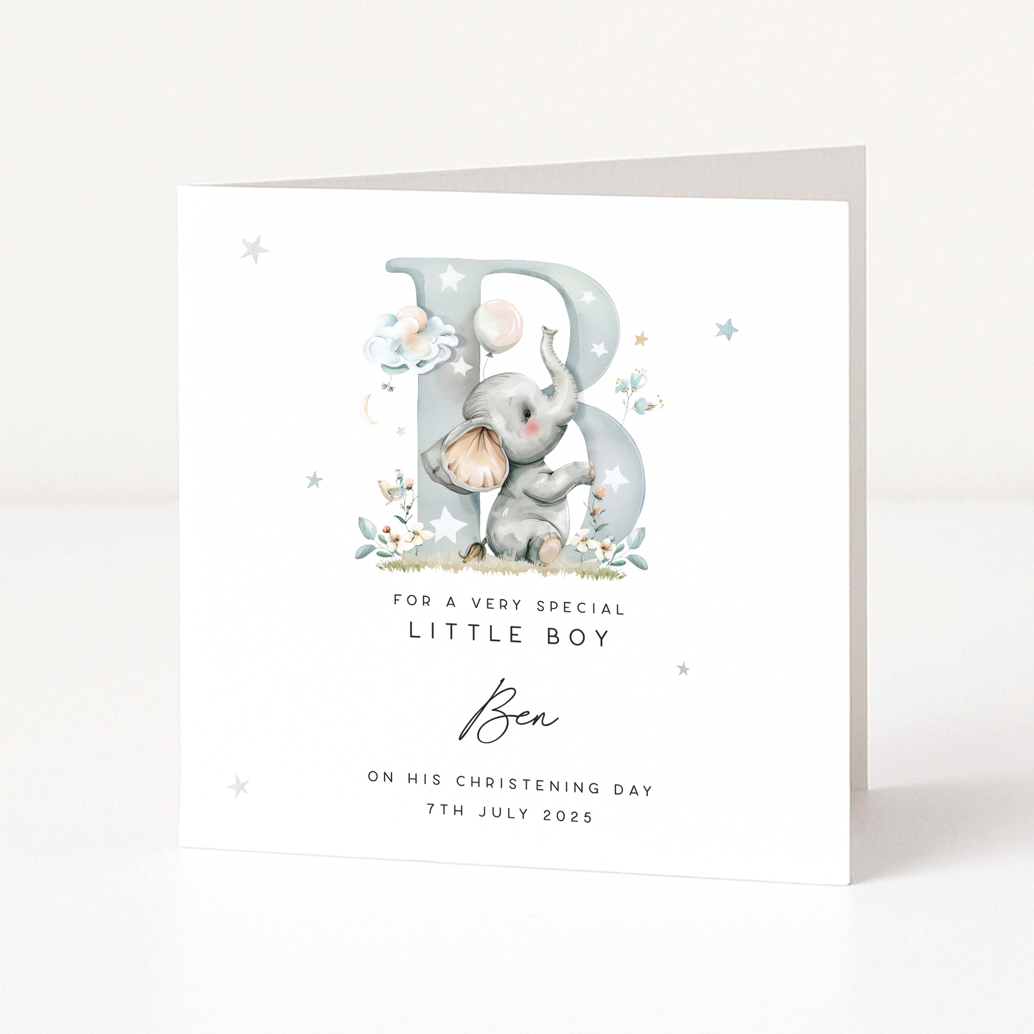 Christening card for a boy with an elephant illustration and personalized text on a white background