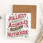 Ceramic Christmas coaster with humorous text and Santa Claus illustration on a white background