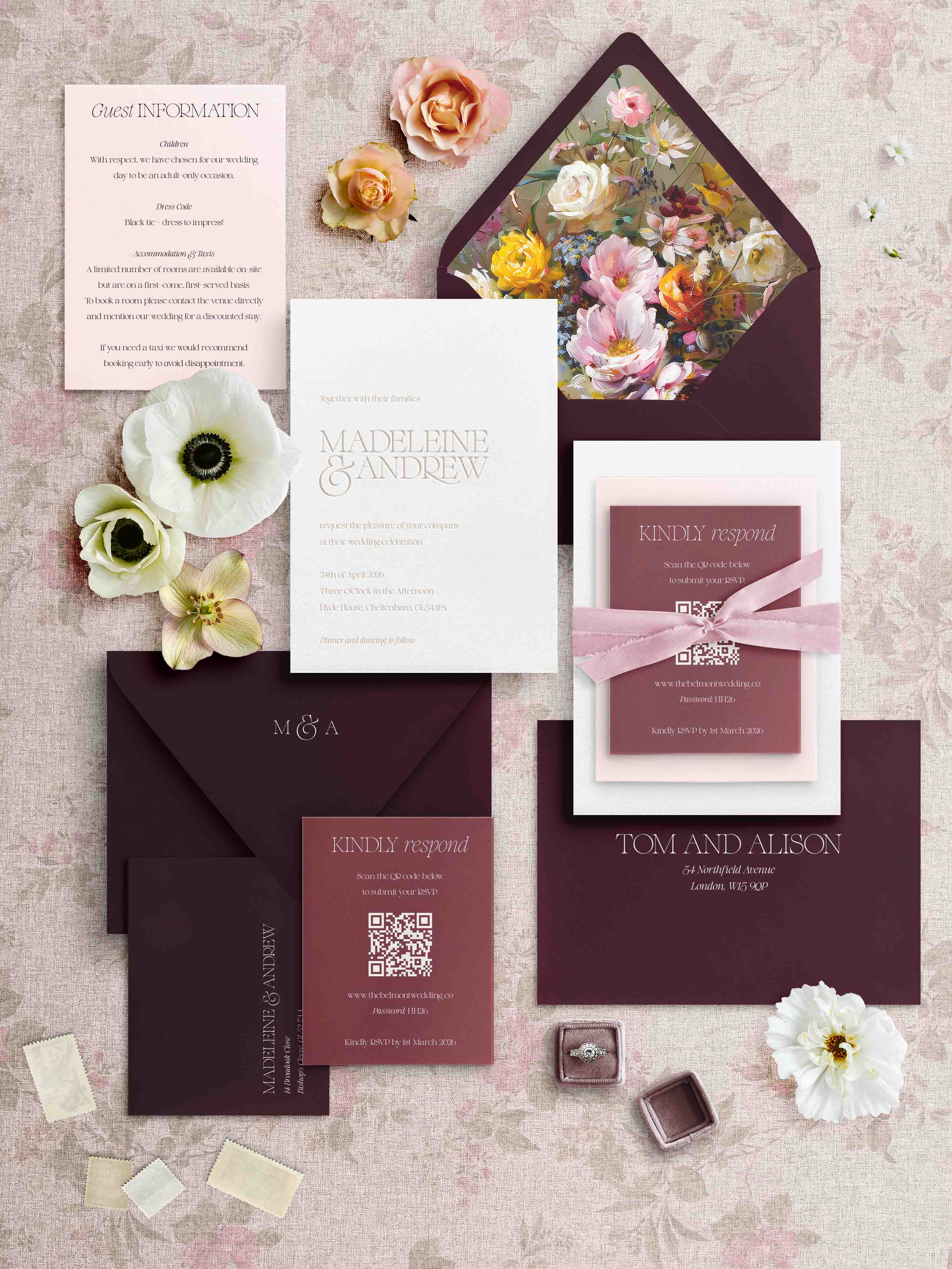 Letterpress Wedding invitation set with floral elements on a textured surface
