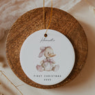 Decorative ornament with a duck illustration and text on a wooden disc.