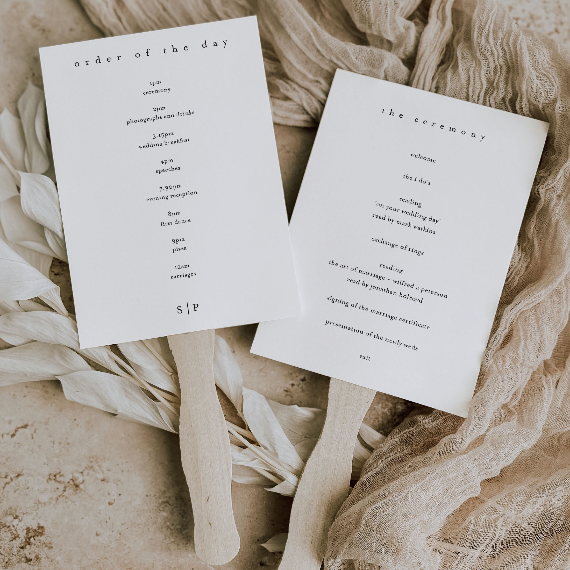 vintage style wedding programme paddle fan on a natural background