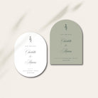 Two wedding save the date cards, one oval and one arch-shaped, on a light background.