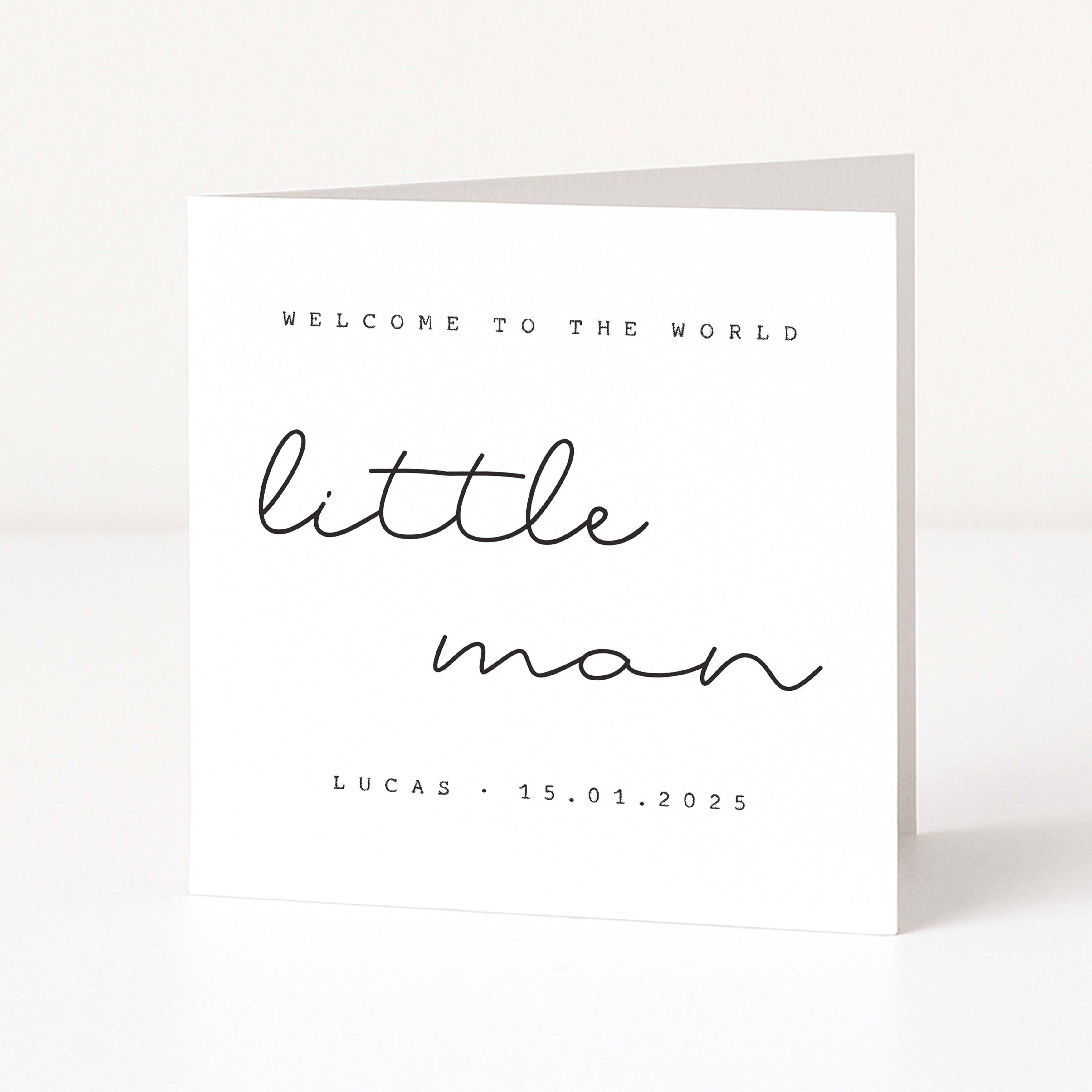 Greeting card with 'Welcome to the world little man' text on a white background
