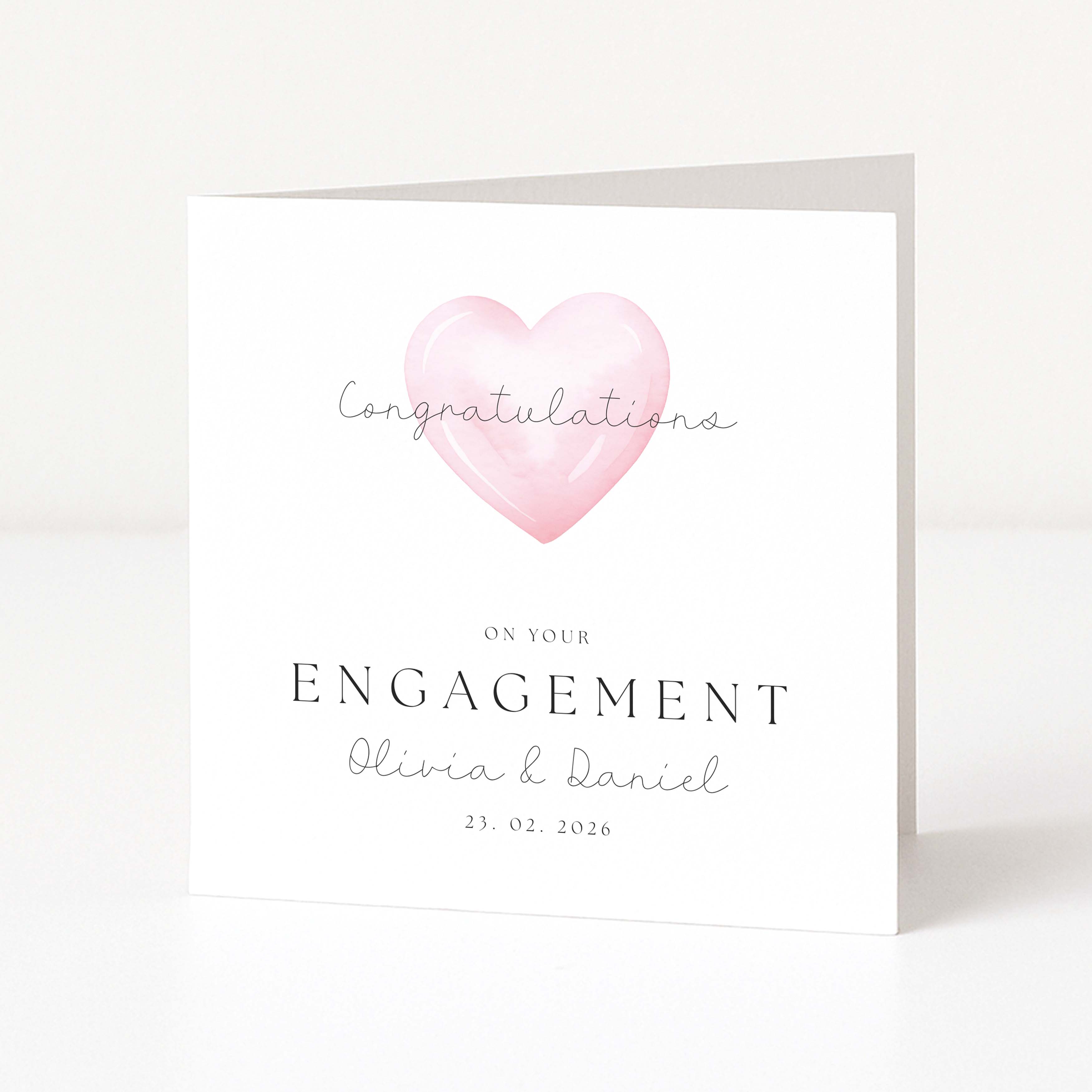Personalised engagement card with a pink heart and text on a white background