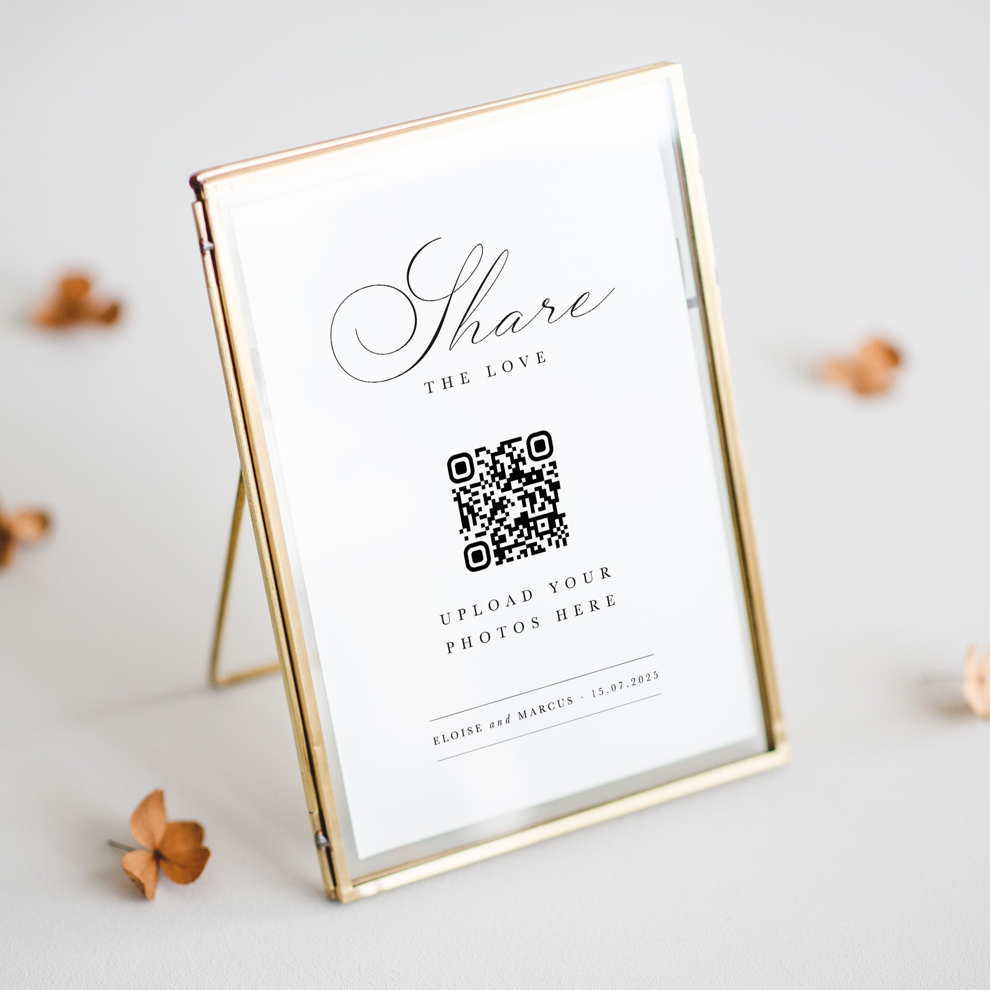 Gold-framed photo display with QR code and text on a light background