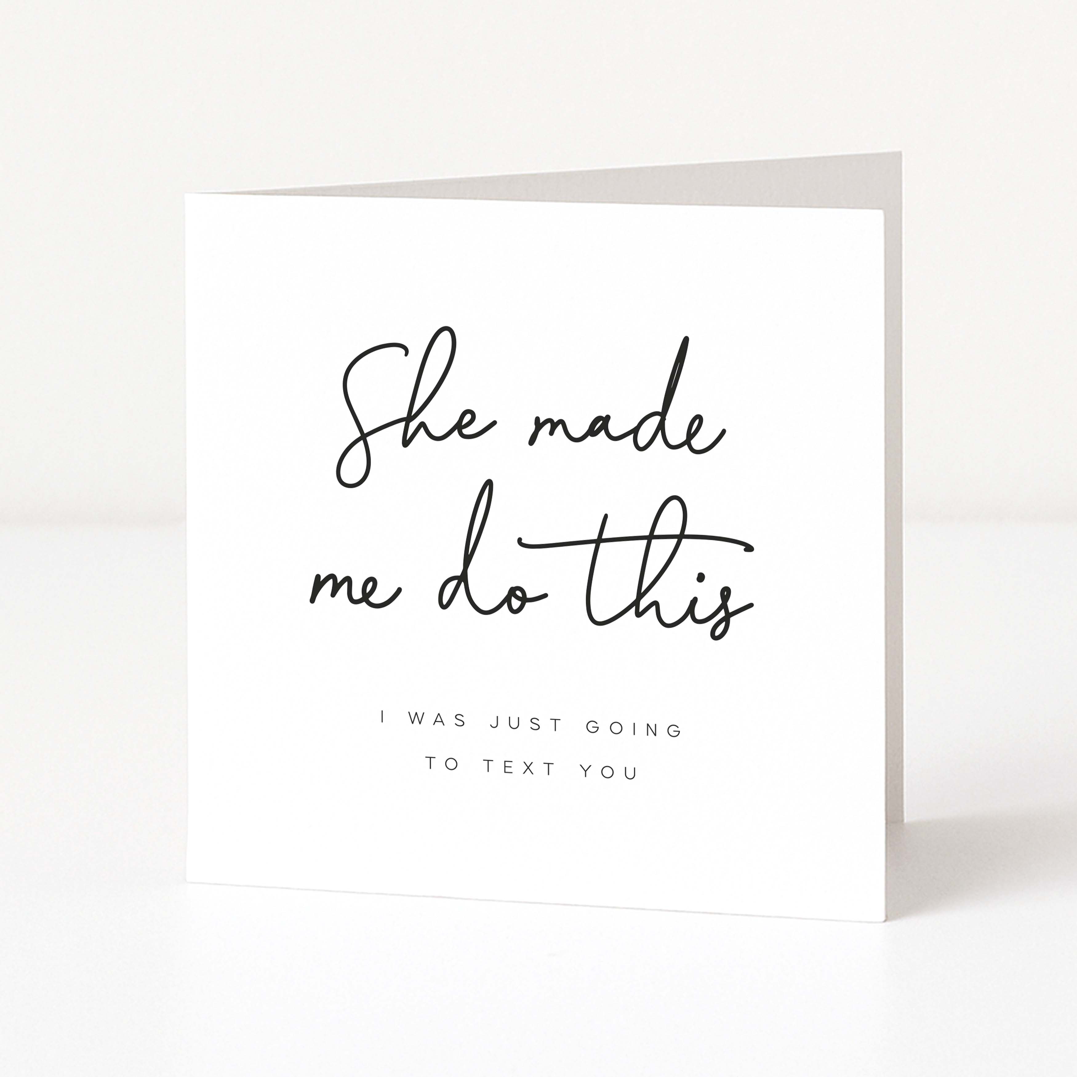 Greeting card with text 'She made me do this. I was just going to text you.' on a white background
