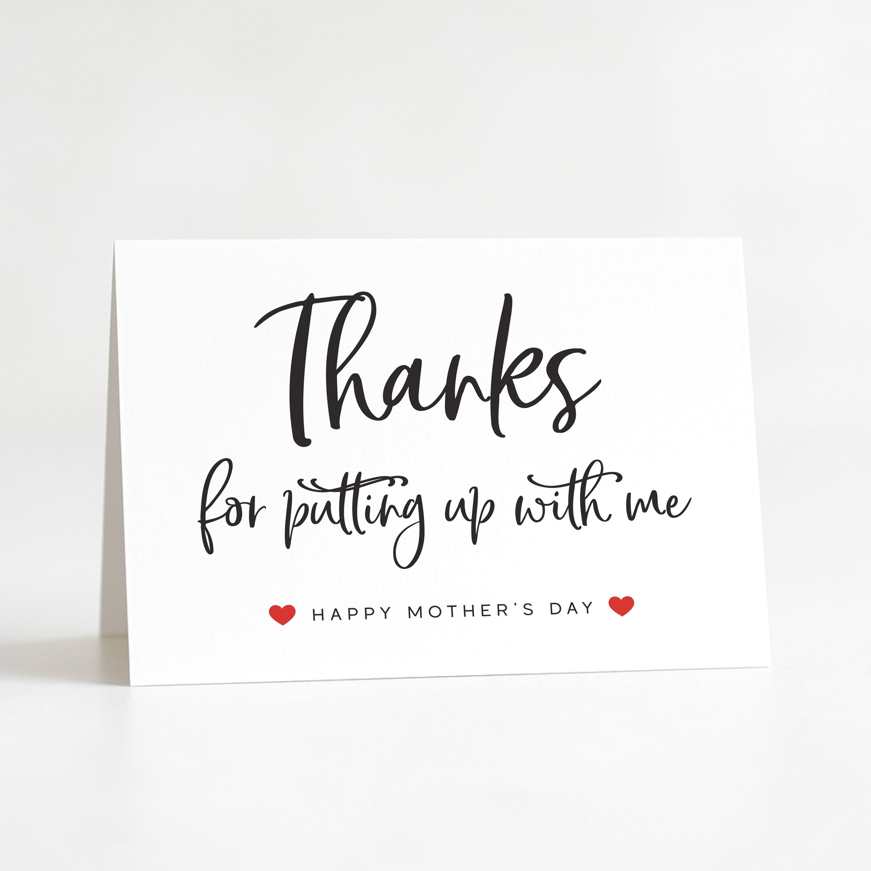 Greeting card with 'Thanks for putting up with me' text and 'Happy Mother's Day' on a white background