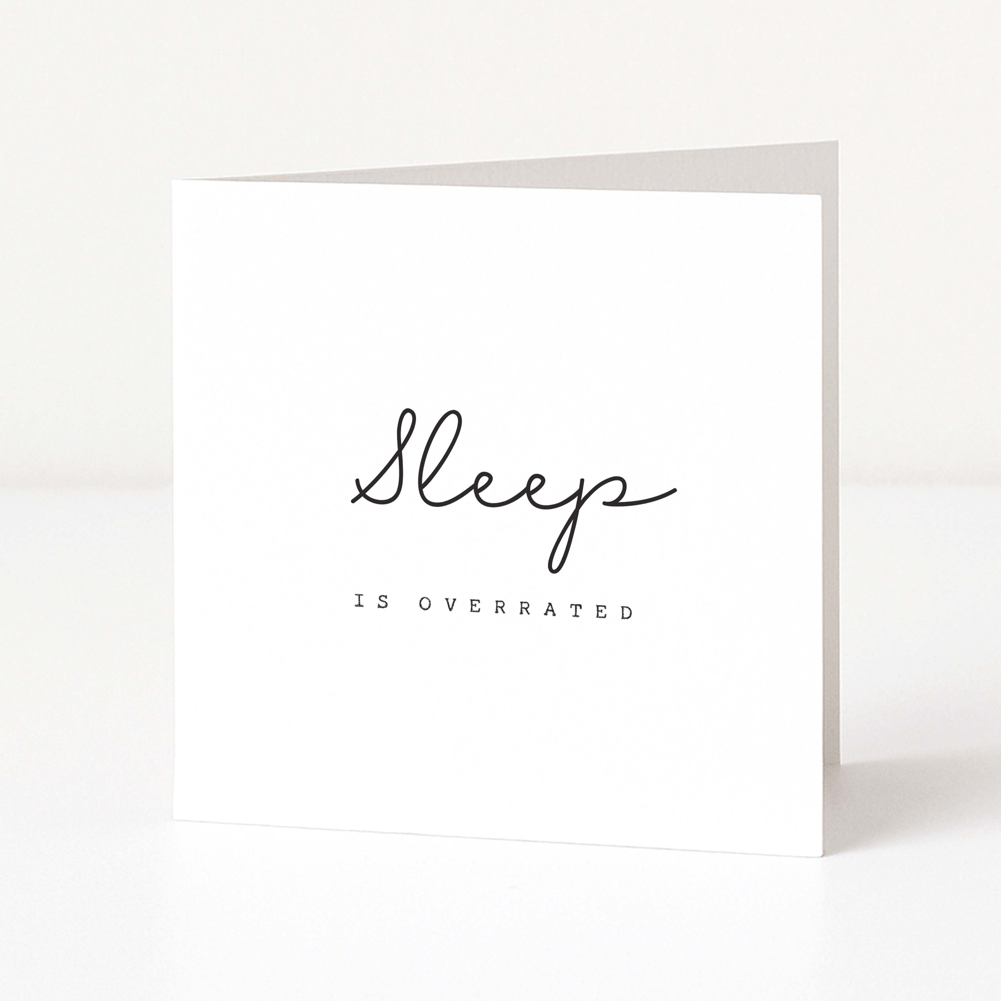 White greeting card with 'Sleep is overrated' text on a white background