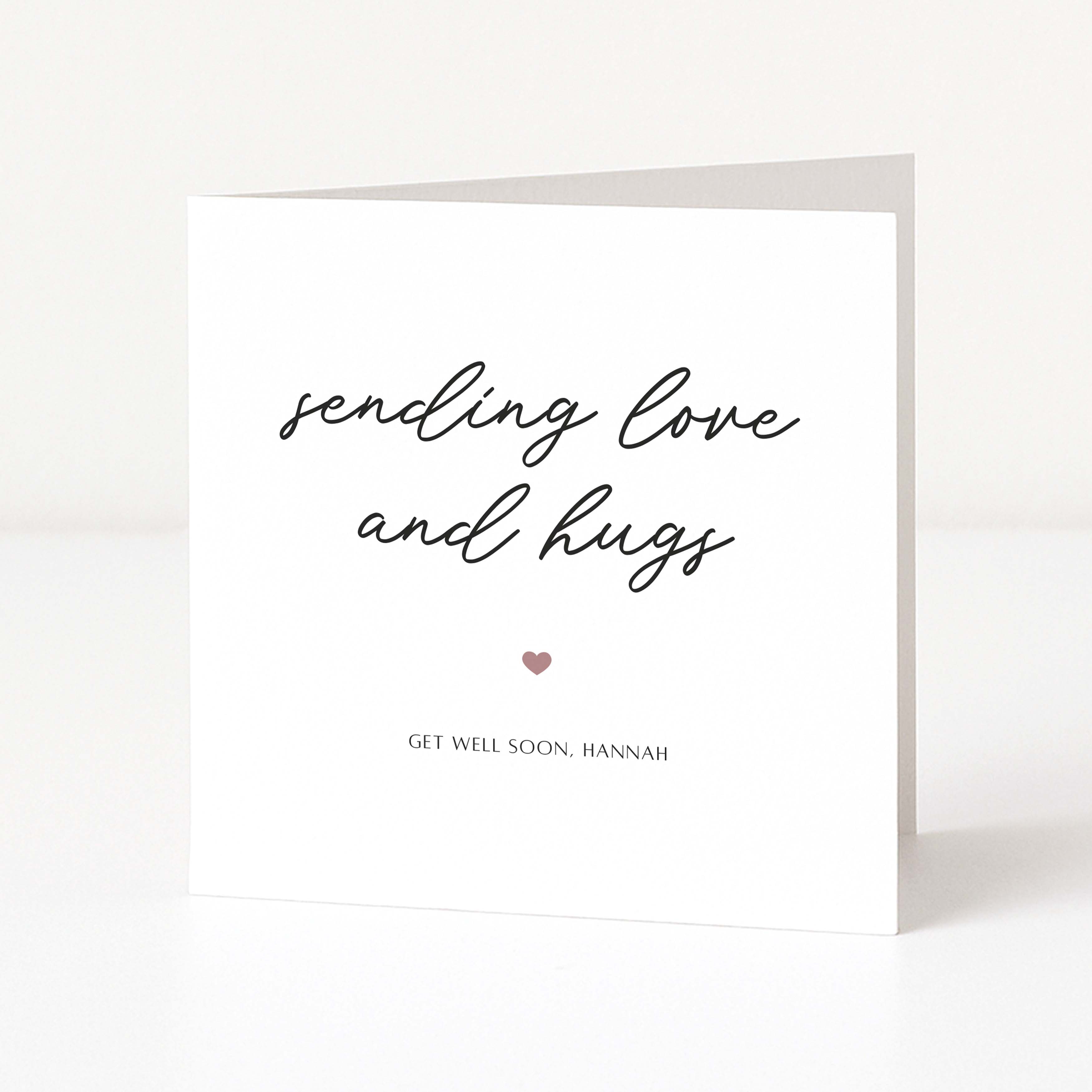 Greeting card with 'sending love and hugs' text and a heart symbol on a white background