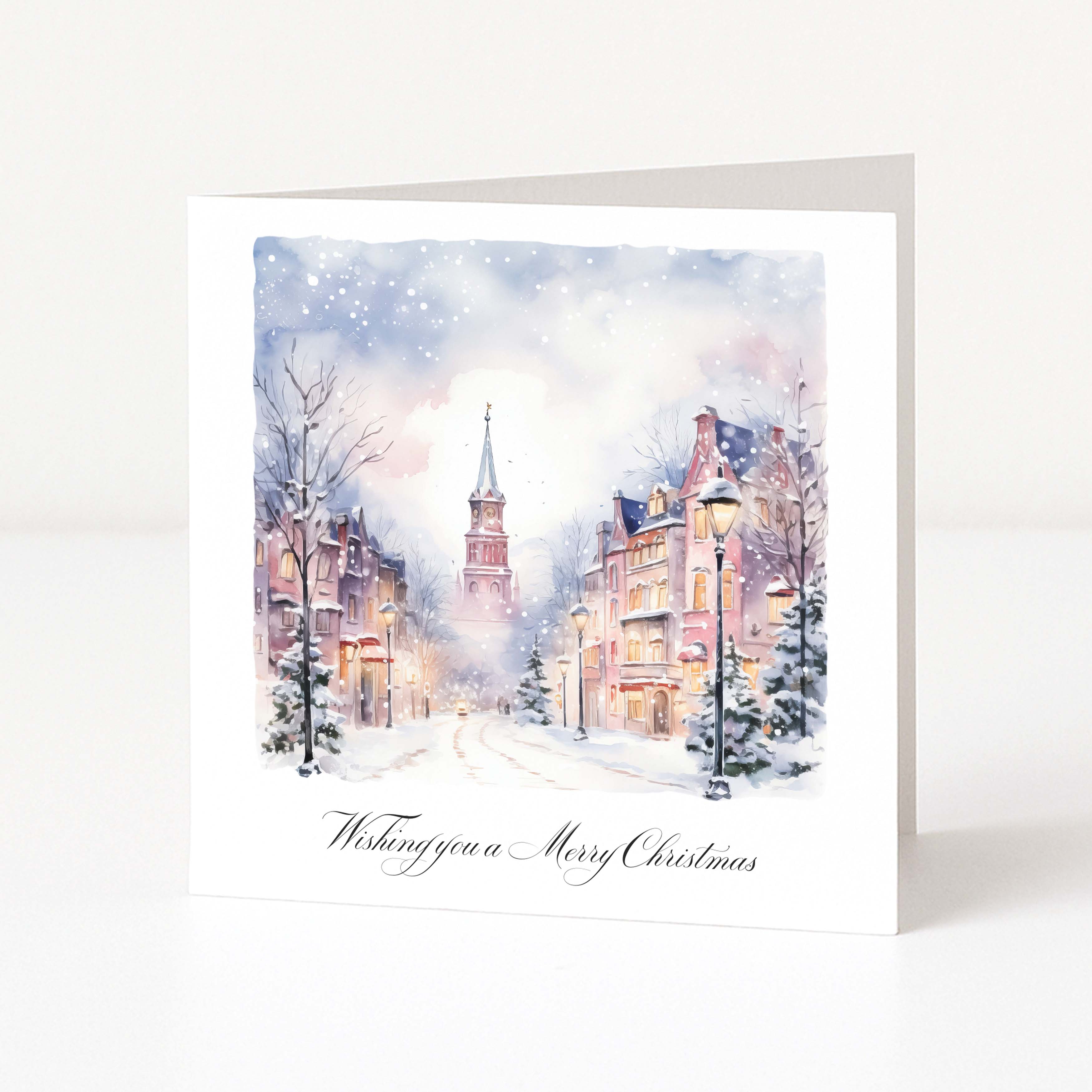 Christmas card with a snowy town scene and 'Merry Christmas' text.