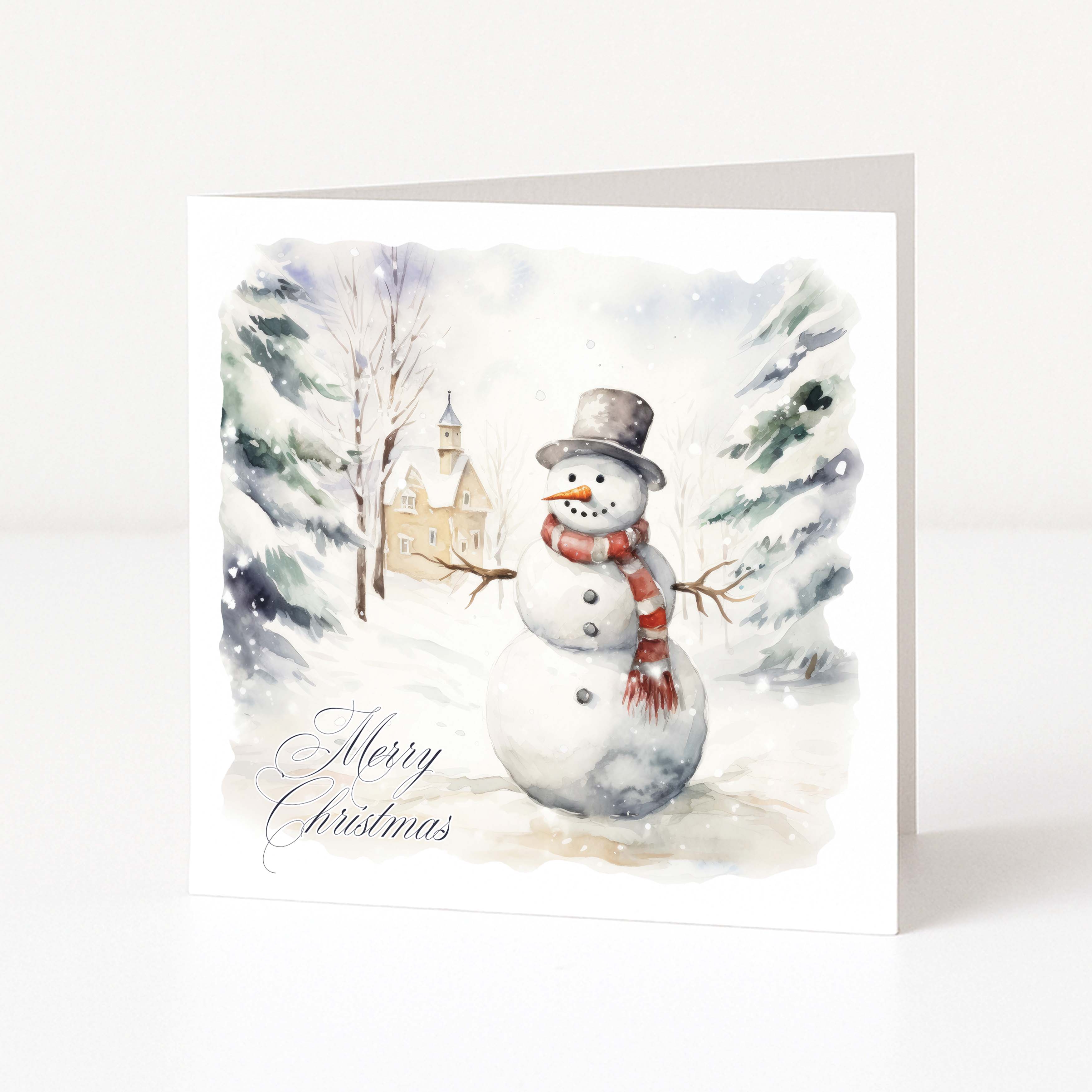 A white Christmas greeting card showing an outdoor snowy scene, snowman and "Merry Christmas" sentiment in elegant script