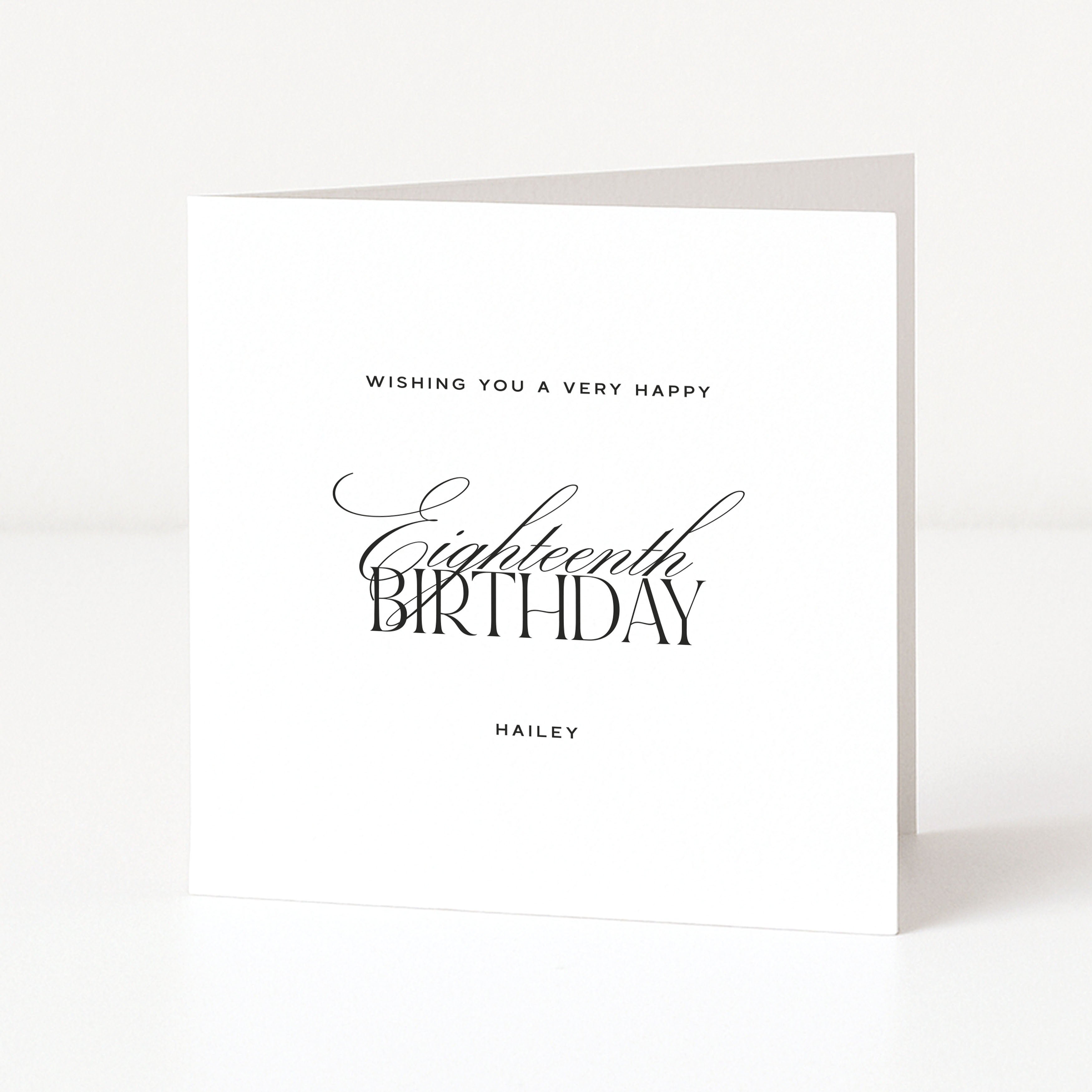 White birthday card with black text on a white background