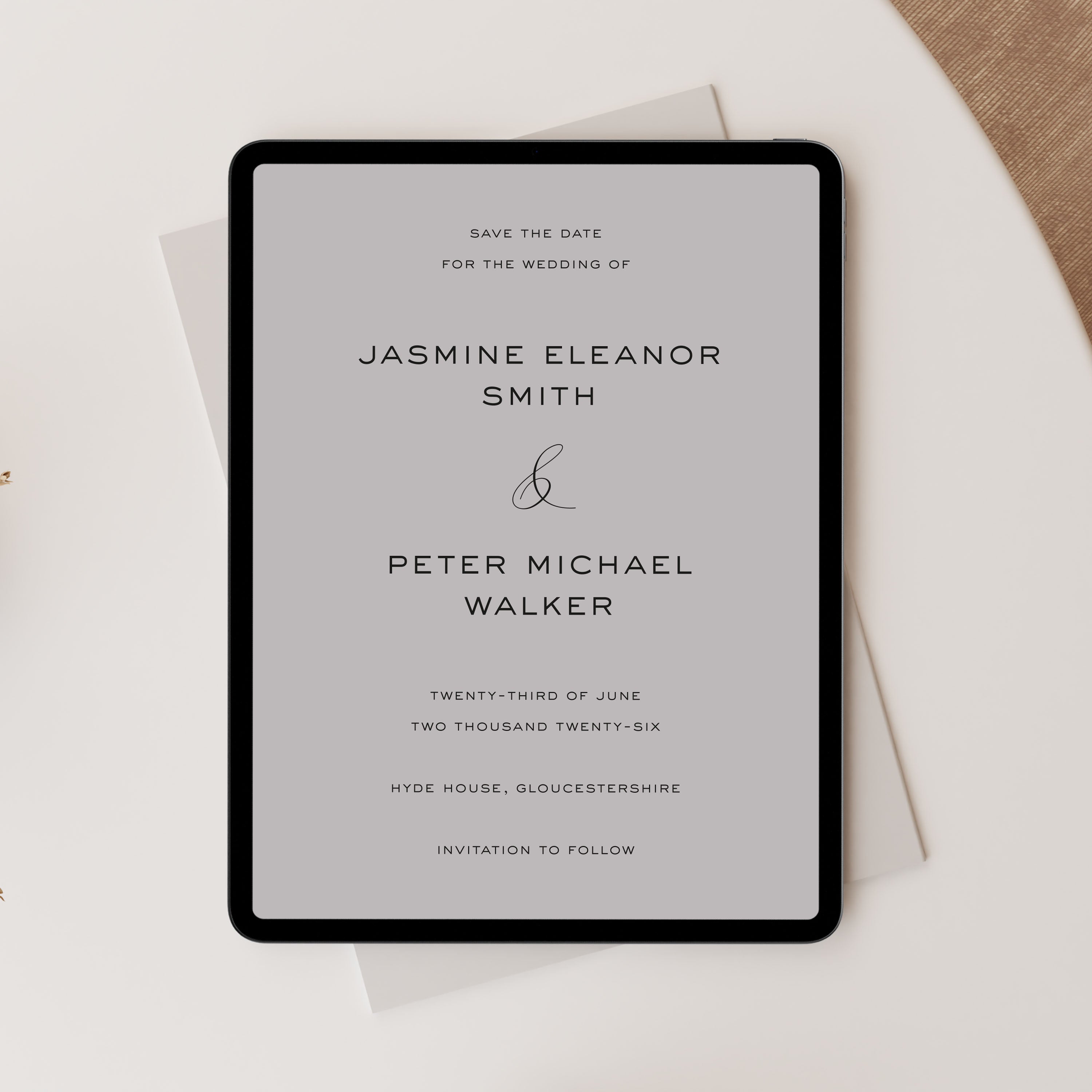 Save the date in digital format for a wedding with a gray background and black text.