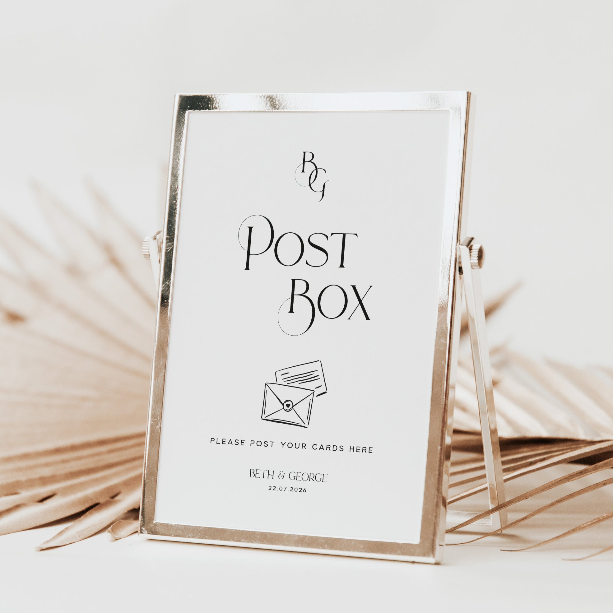 Decorative post box sign for wedding reception with 'Post Box' text and design on a light background