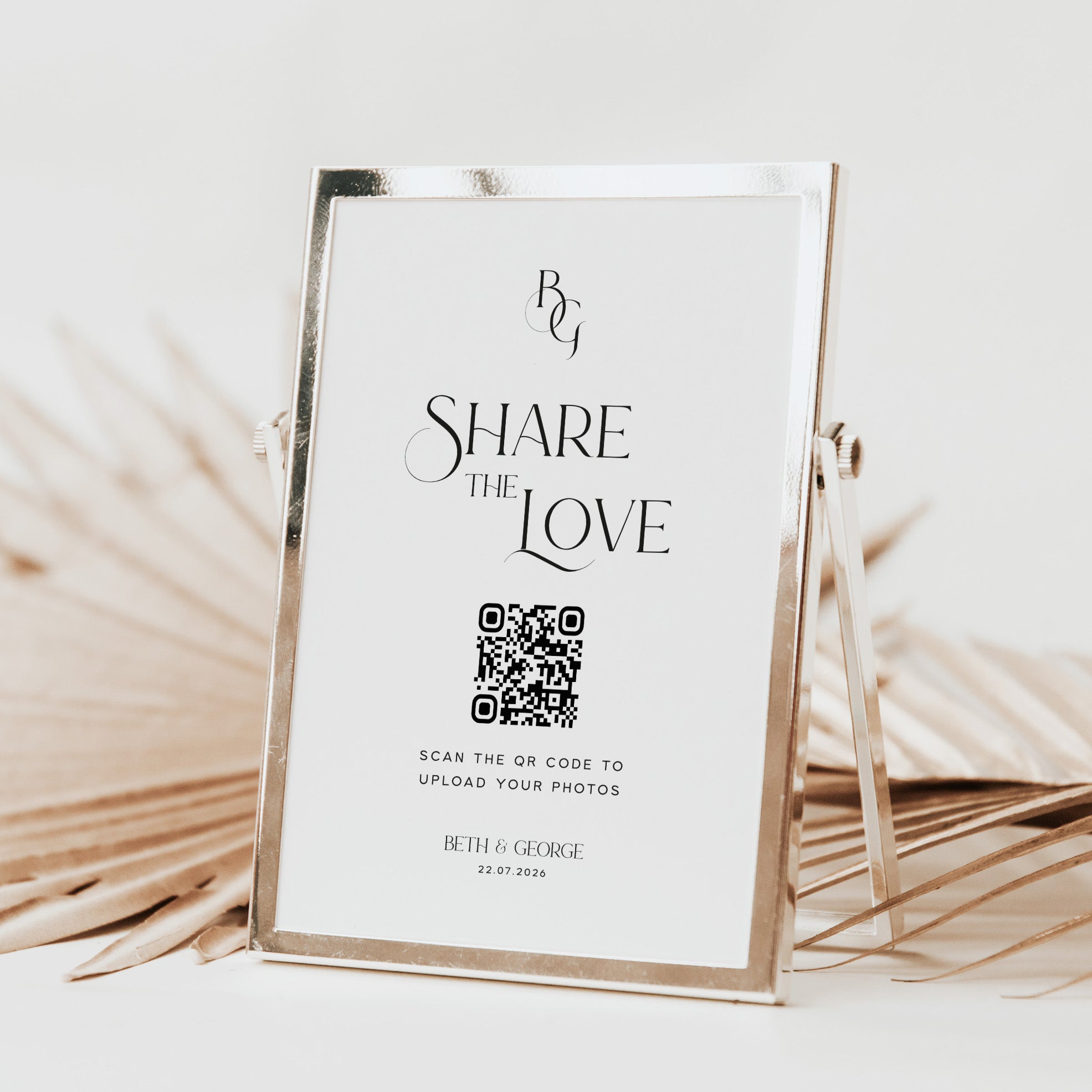 Framed QR code sign for wedding reception with 'Share the Love' text on a light background