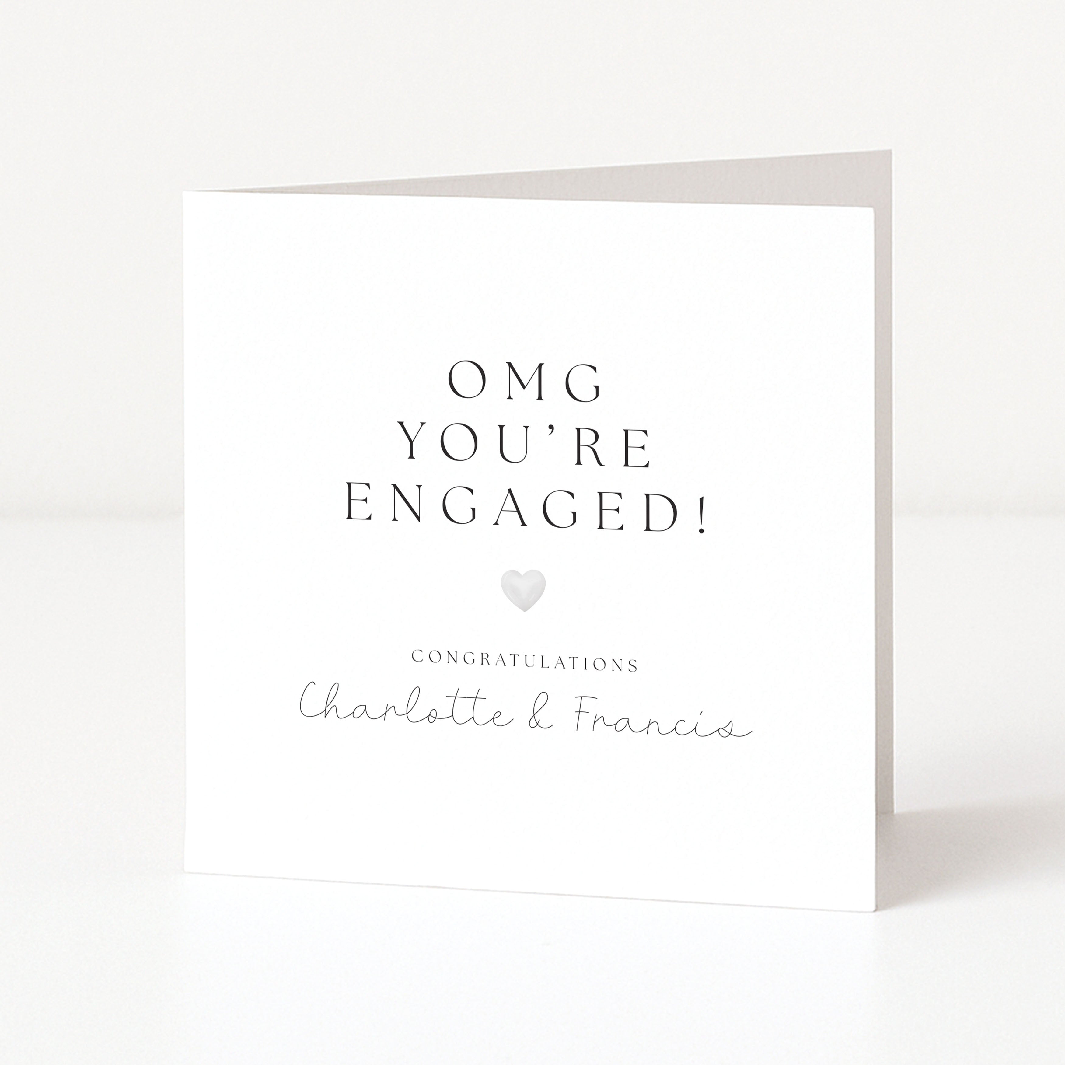 Greeting card with 'OMG YOU'RE ENGAGED!' text on a white background