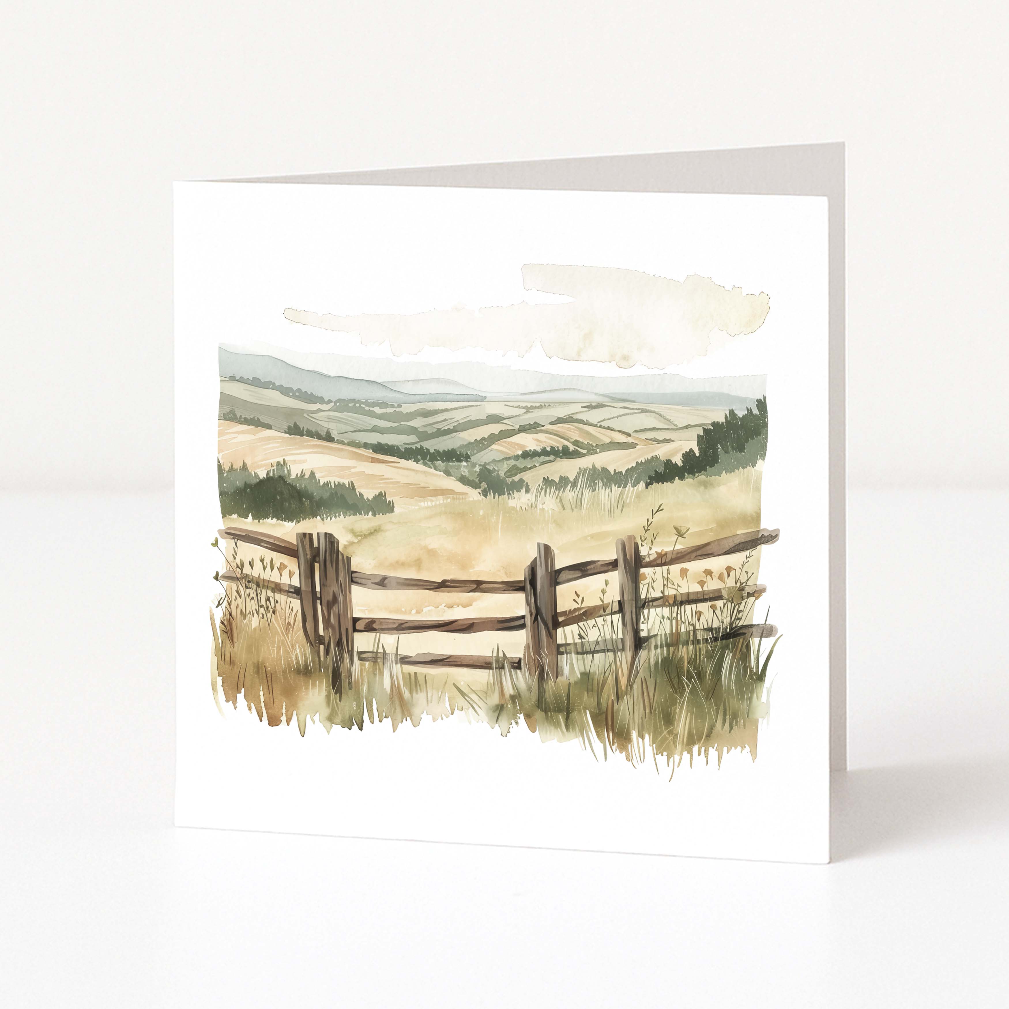 Greeting card with a scenic landscape featuring a wooden fence on a white background