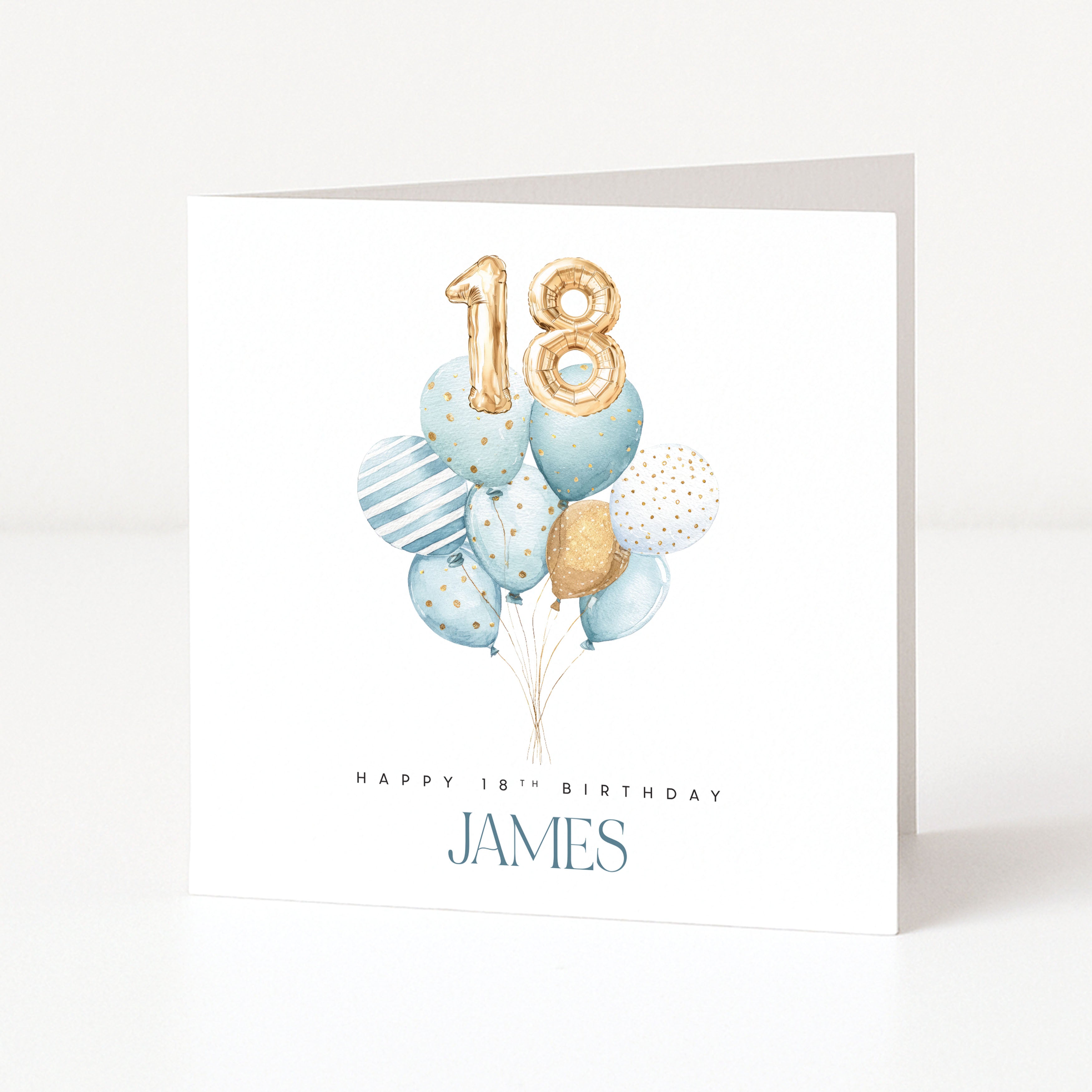 Birthday card with blue balloons, gold number 18, and 'Happy 18th Birthday James' text on a white background.