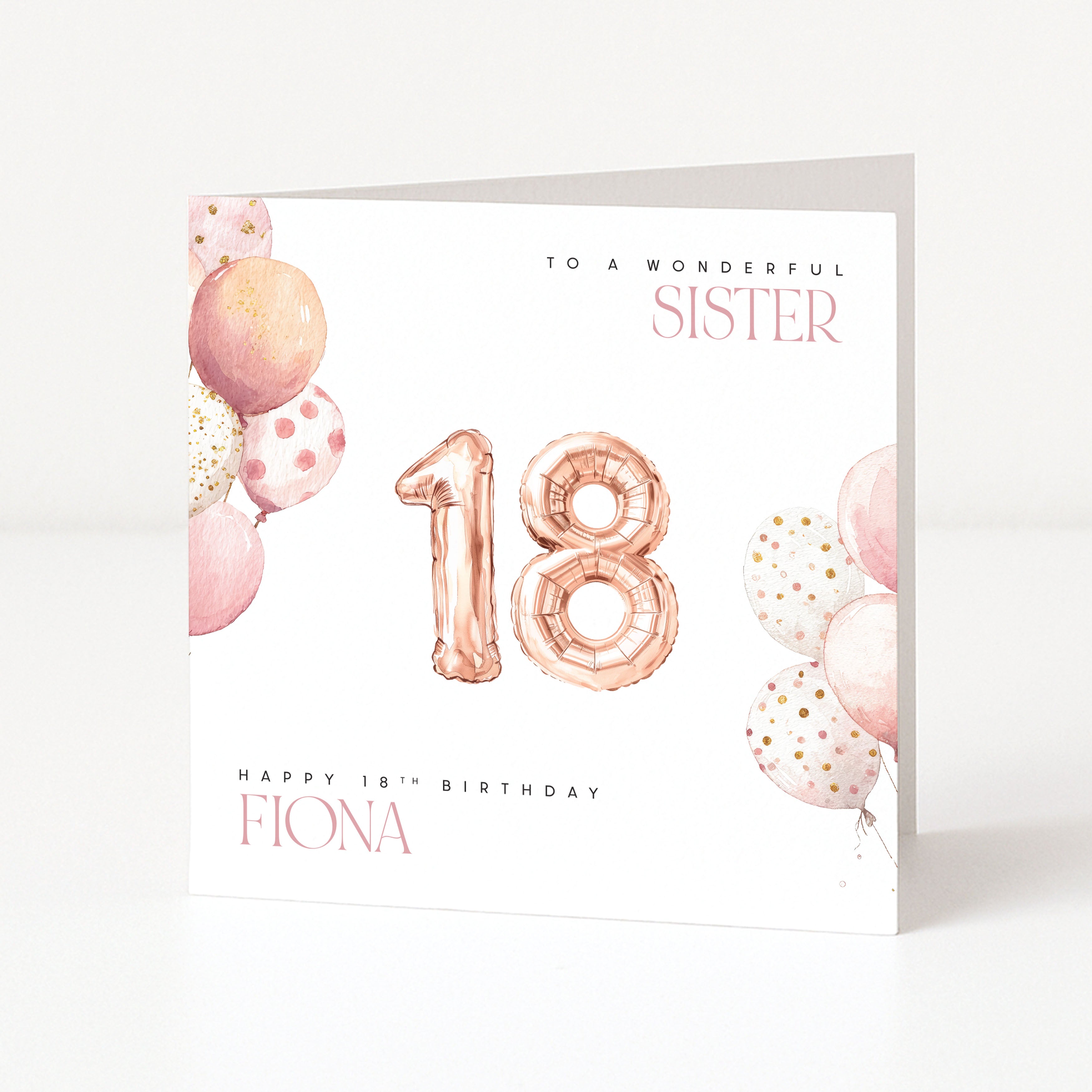 Greeting card with rose gold balloons and '18' for a 18th birthday celebration.