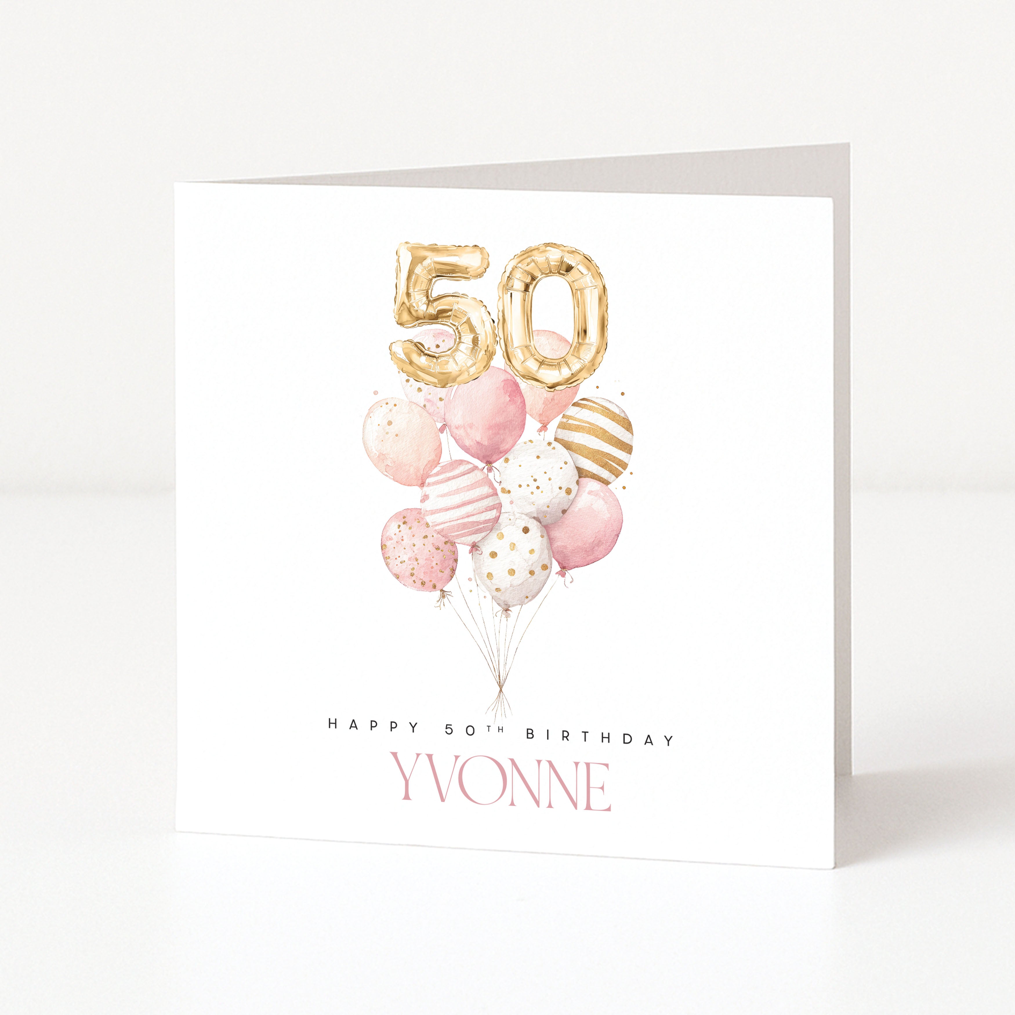Personalised square 50th birthday card for her featuring a pink watercolour balloon bouquet cluster topped with gold foil balloon numbers fifty, and customisable front name text.