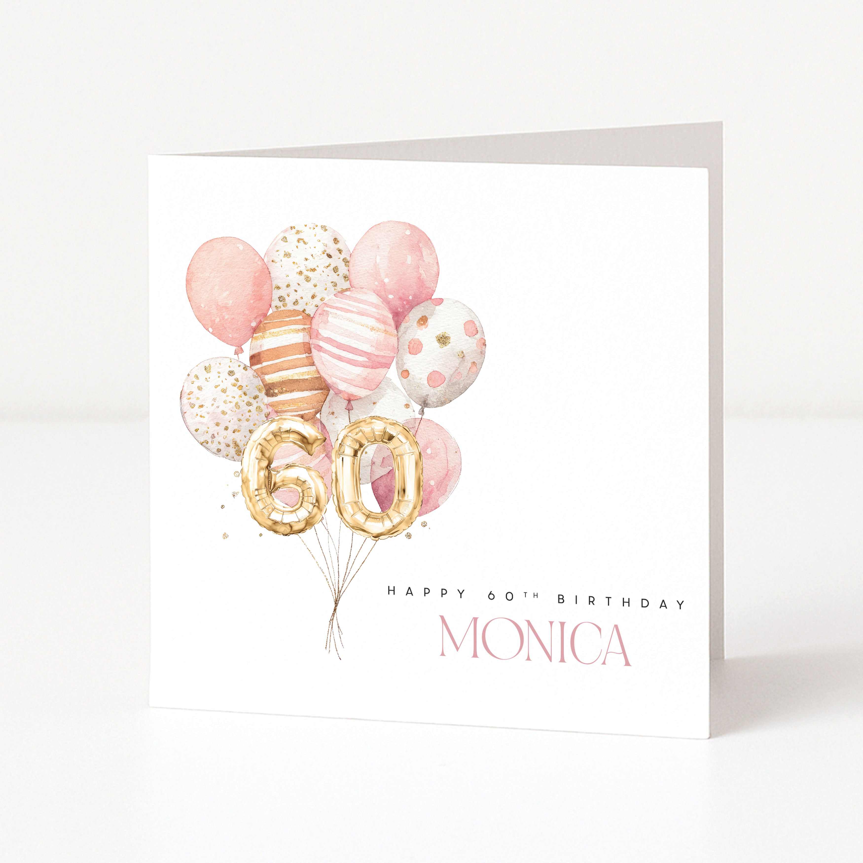 Personalised 60th birthday card with balloon bunch, gold number balloons and the name Monica.