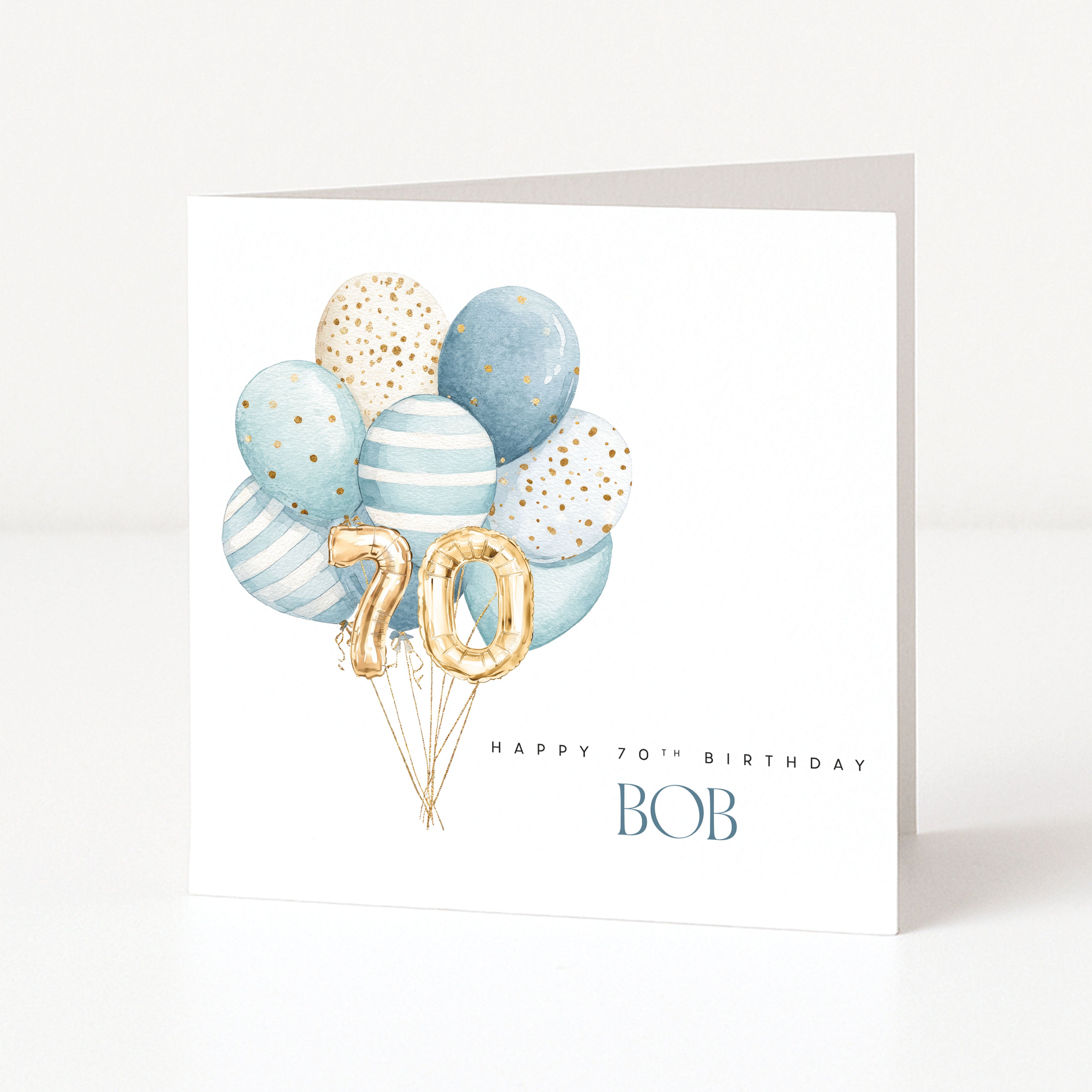 Personalised 70th birthday card for Bob with blue watercolour balloons and gold 70 number balloons.