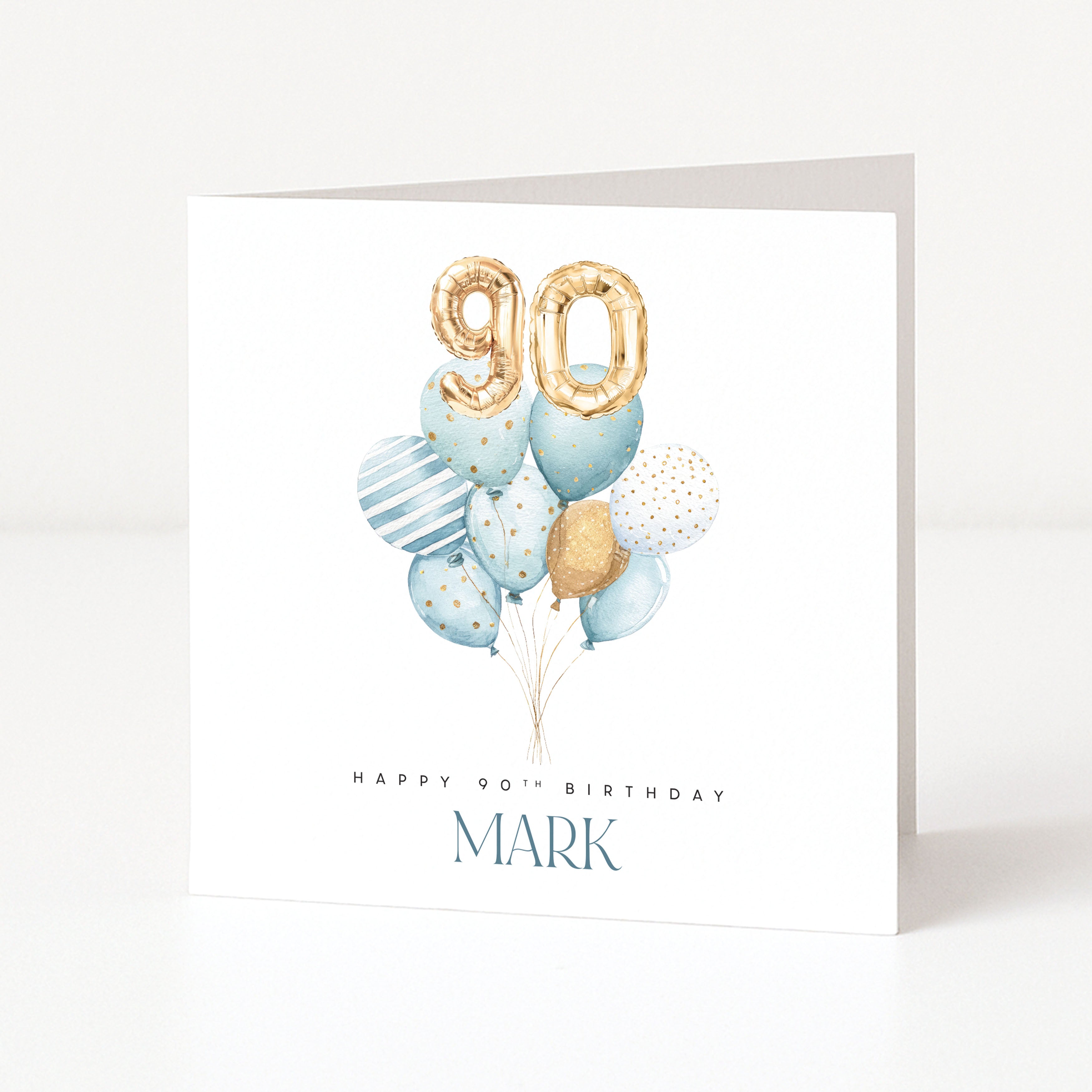 Personalised 90th birthday card for him with gold 90 balloons, blue watercolour balloon bouquet and name Mark