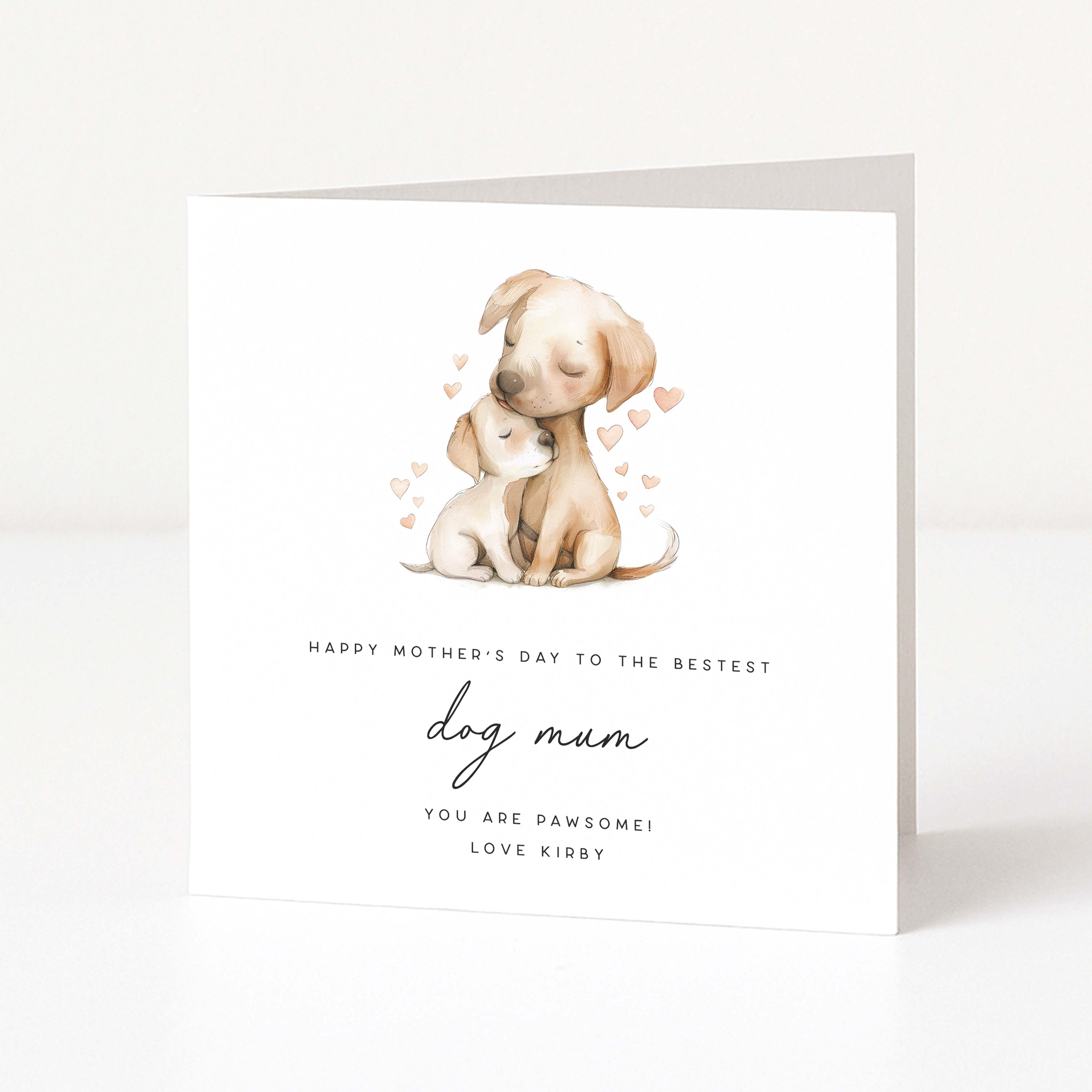 Greeting card with two puppies and hearts on a white background