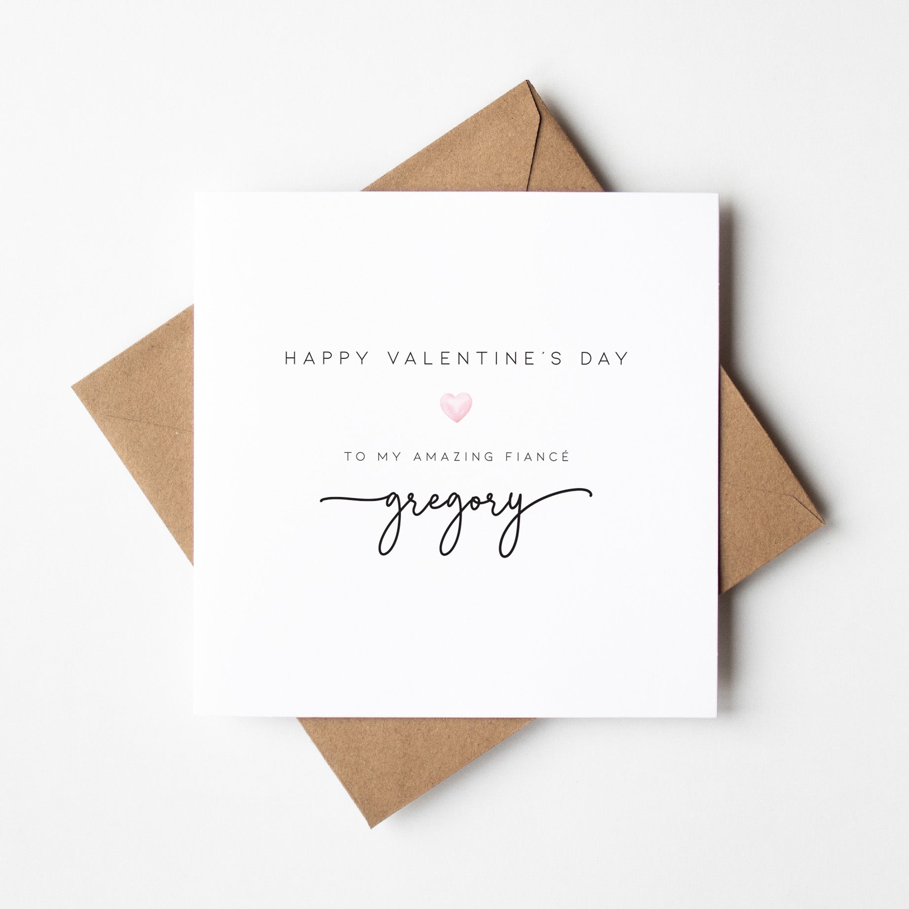 Valentine's Day card with 'Happy Valentine's Day' and 'to my amazing fiance Gregory' text on a white background.