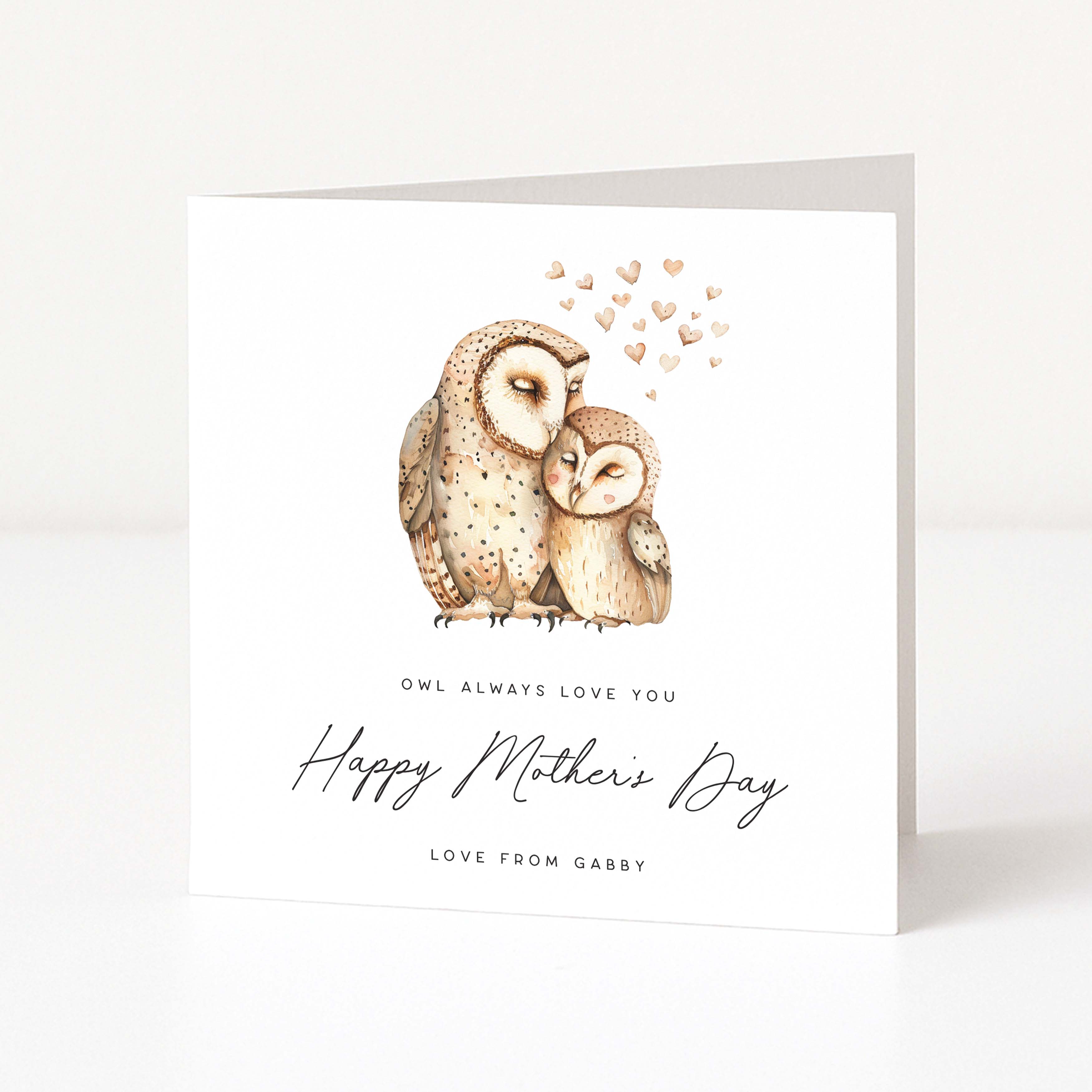 Greeting card with illustration of two owls and 'Happy Mother's Day' text on a white background