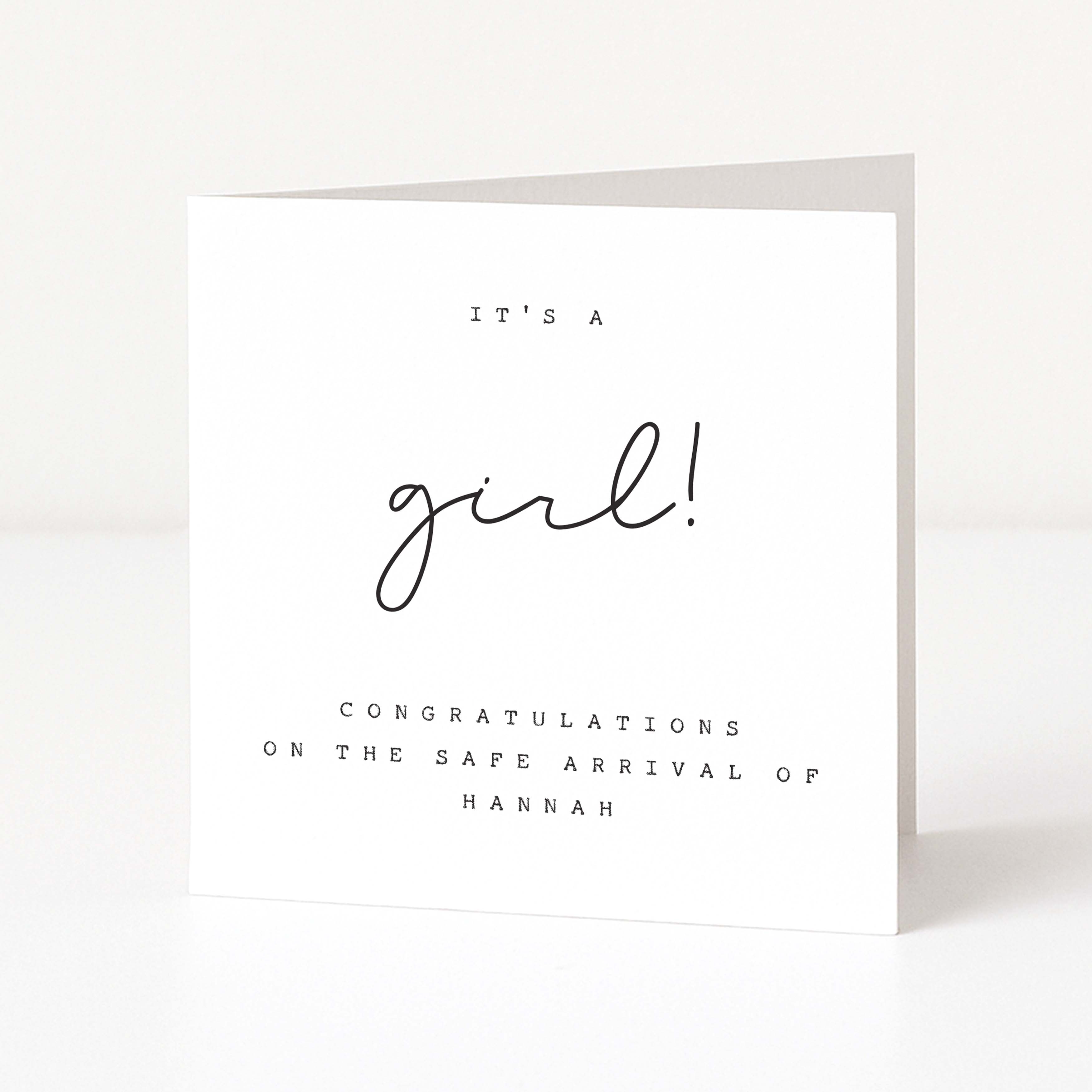 Greeting card with 'It's a girl!' text on a white background