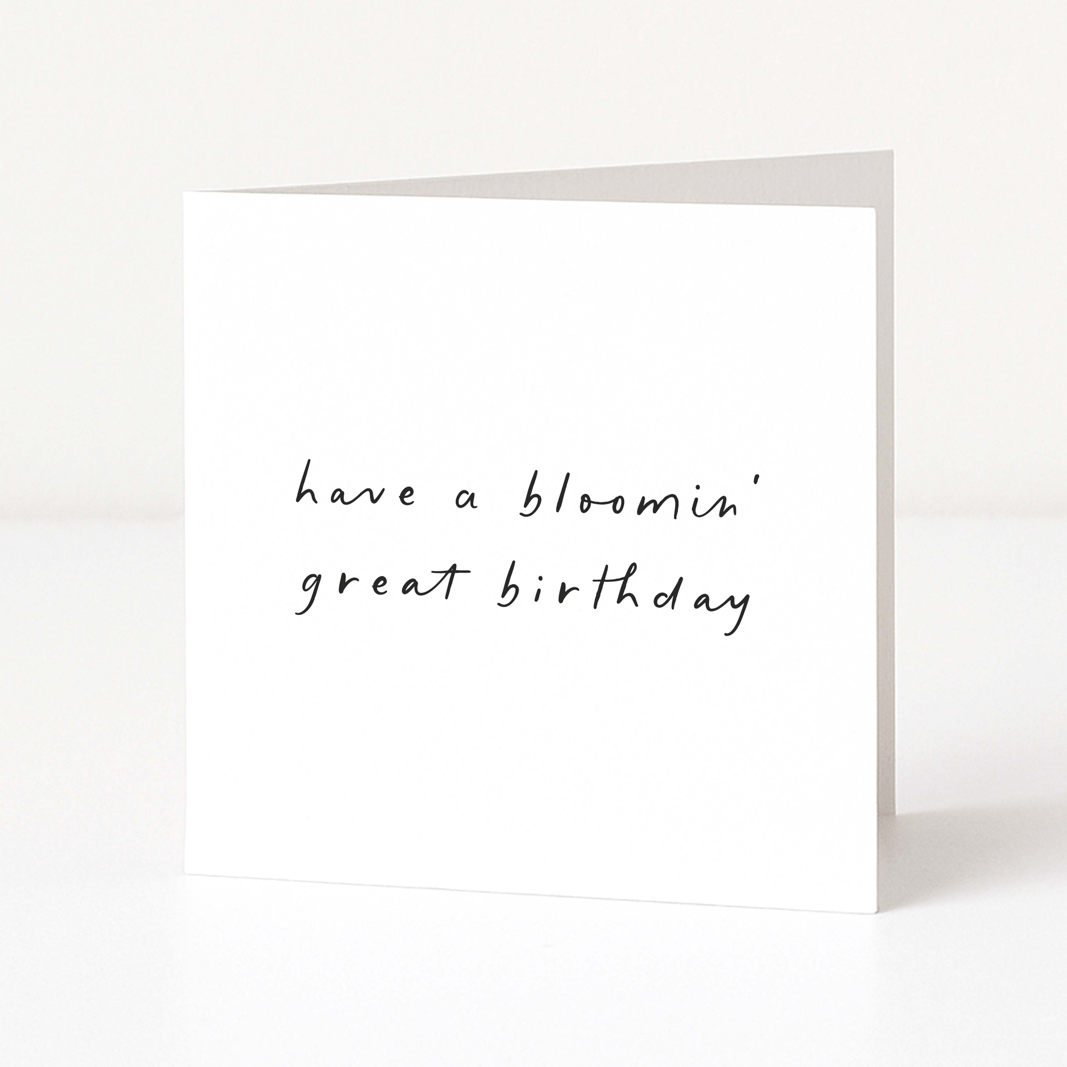 White card with black text 'have a bloomin' great birthday' on a white background