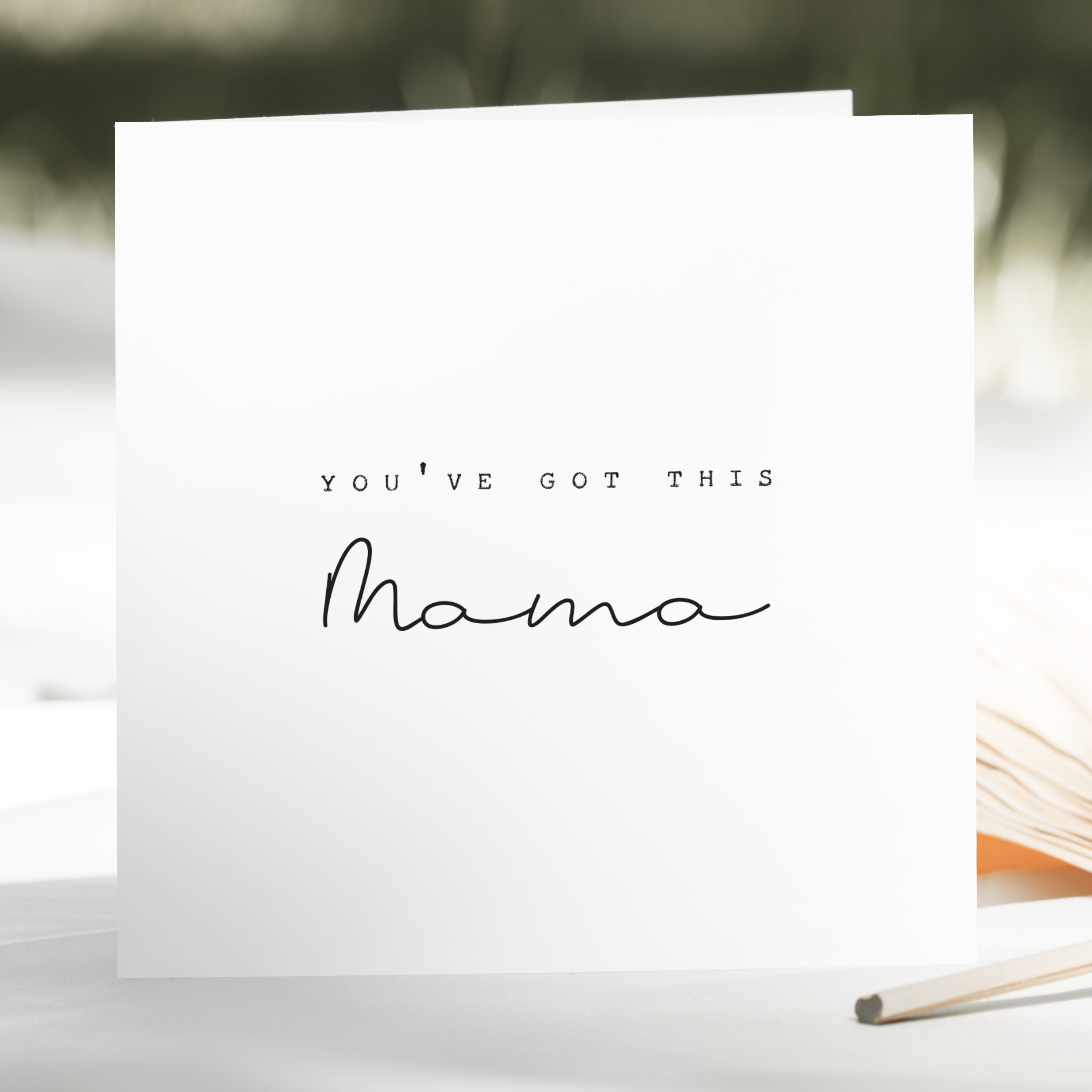 Greeting card with 'You've Got This Mama' text on a blurred background