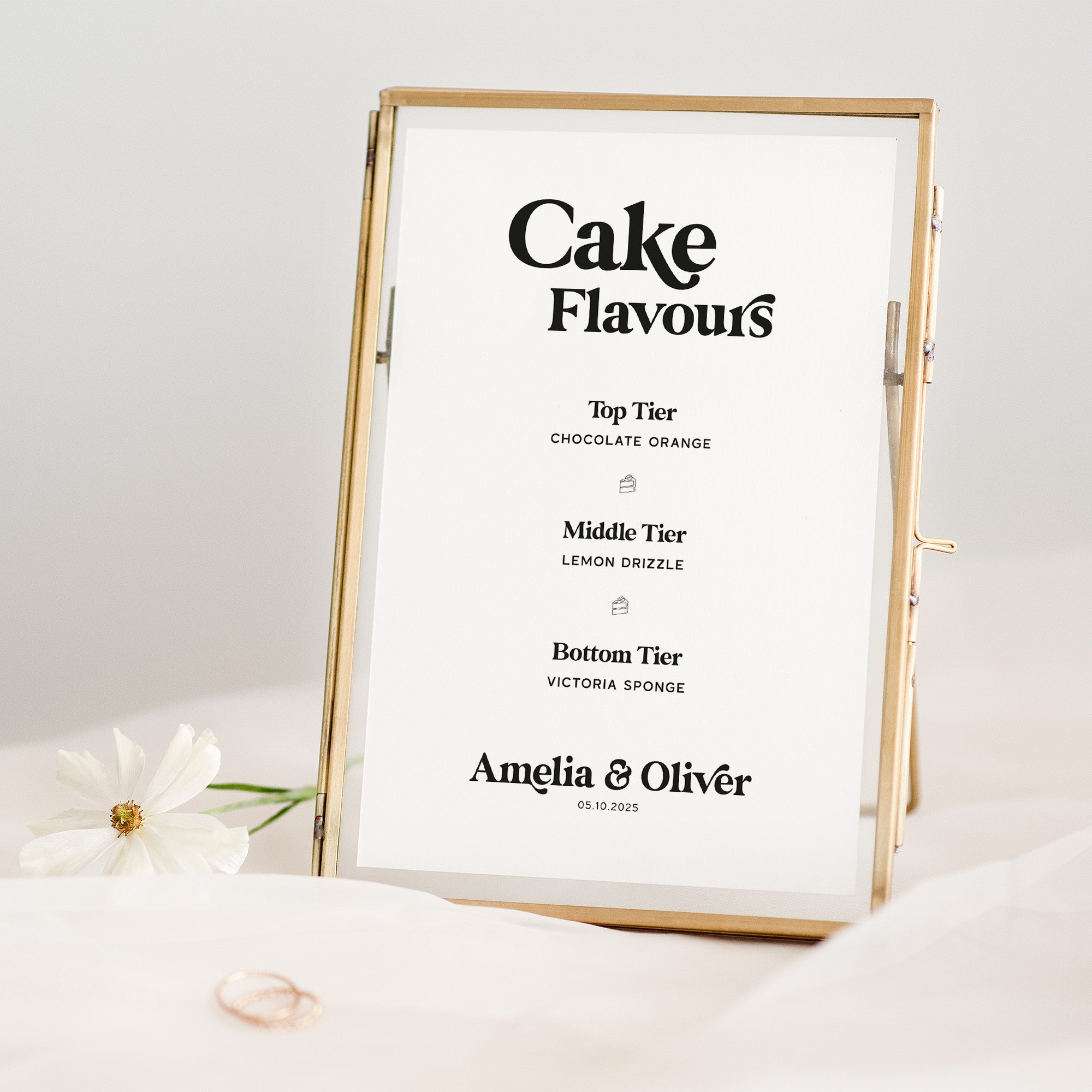 Framed wedding cake flavor sign with 'Cake Flavours' details on a white background