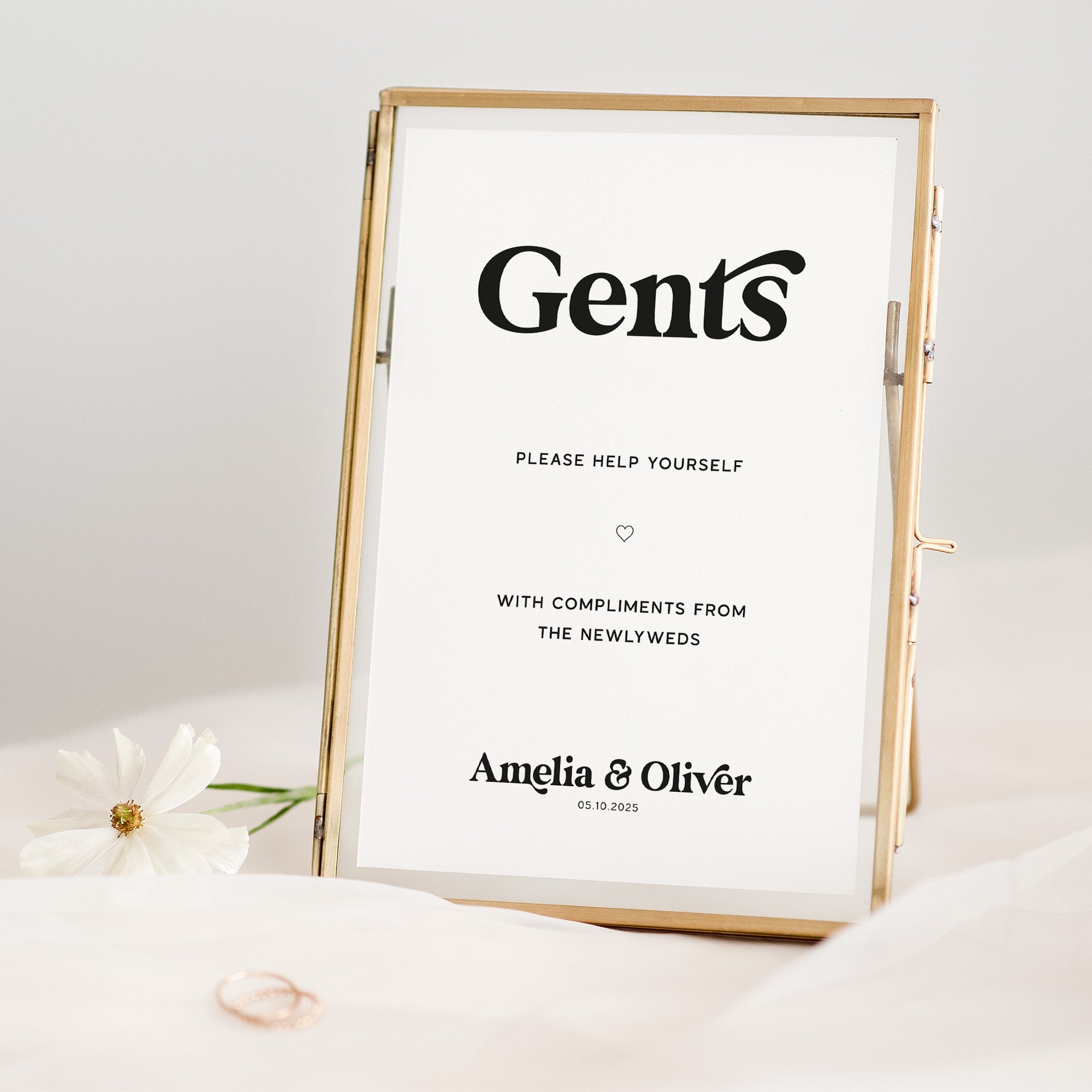 Decorative sign with 'Gents' and personalized text in a gold frame on a white background