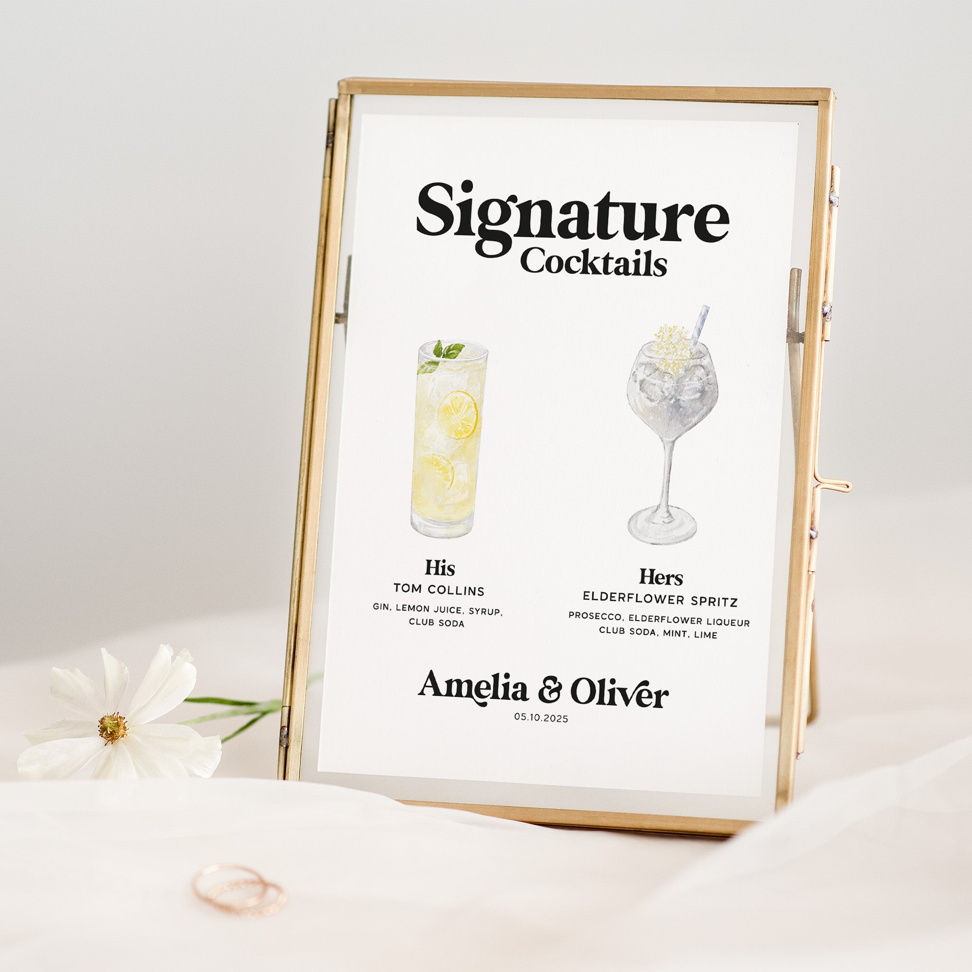 Framed cocktail menu with 'Signature Cocktails' on a white background