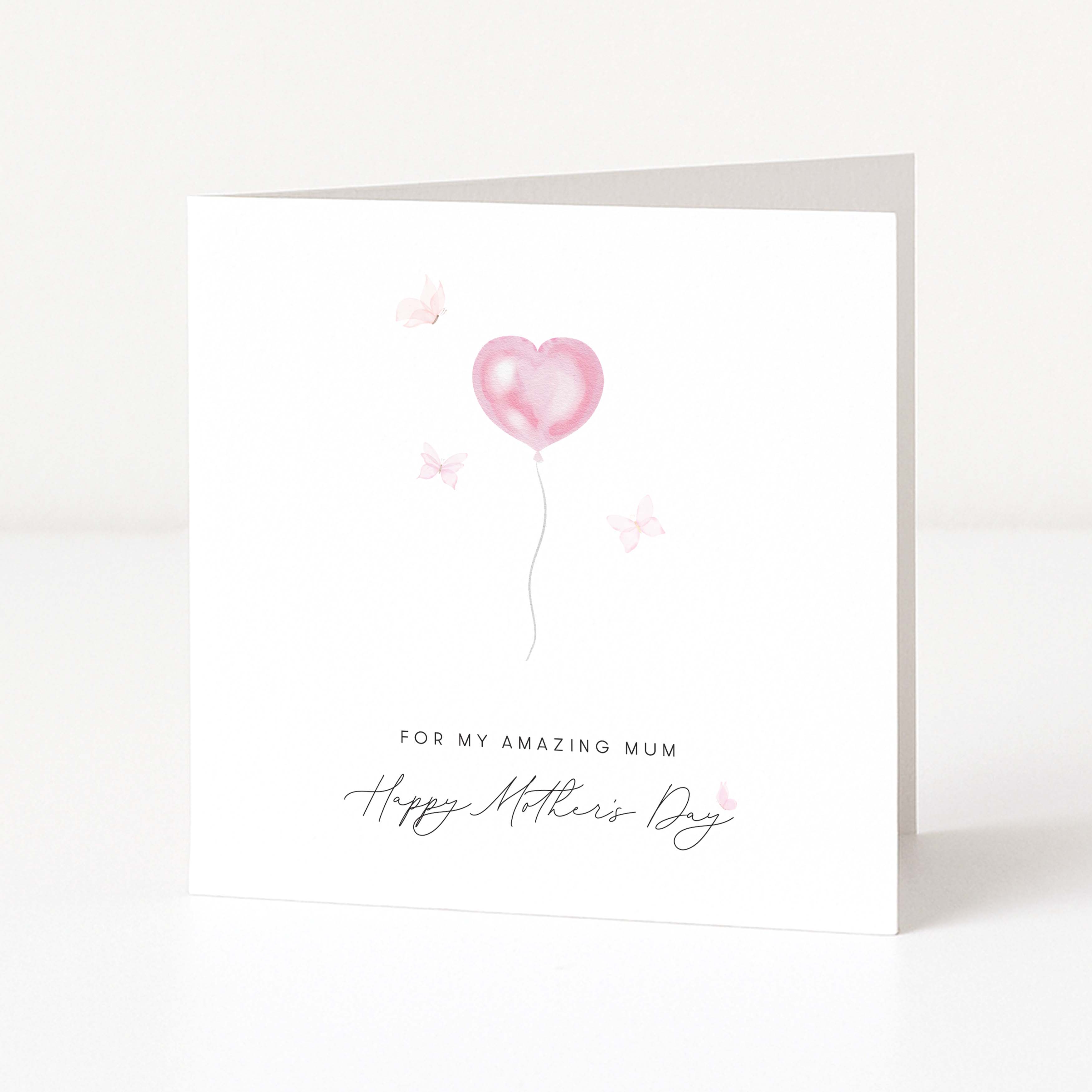 Greeting card with pink heart balloon and 'Happy Mother's Day' text on a white background