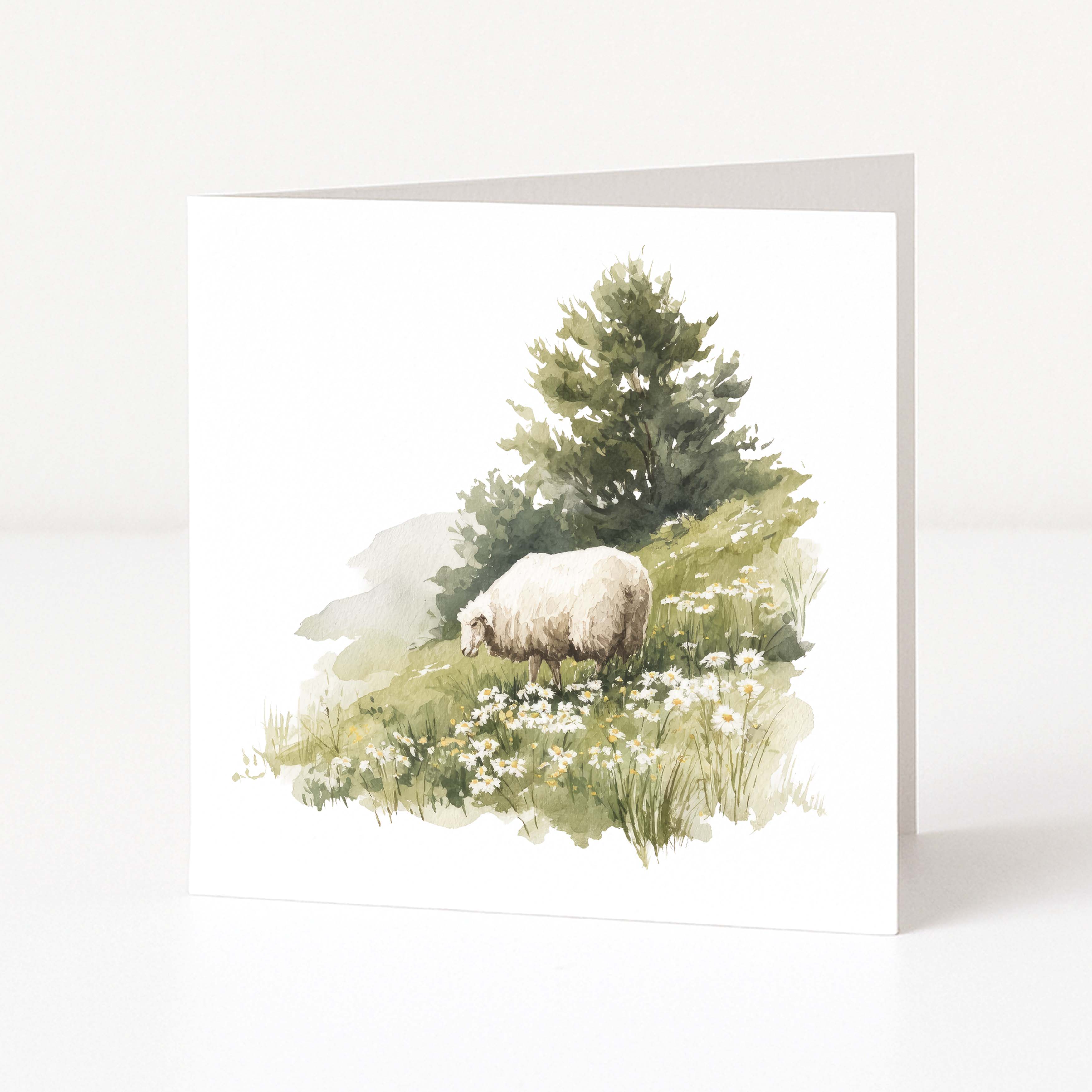 Greeting card with a sheep and tree design on a white background